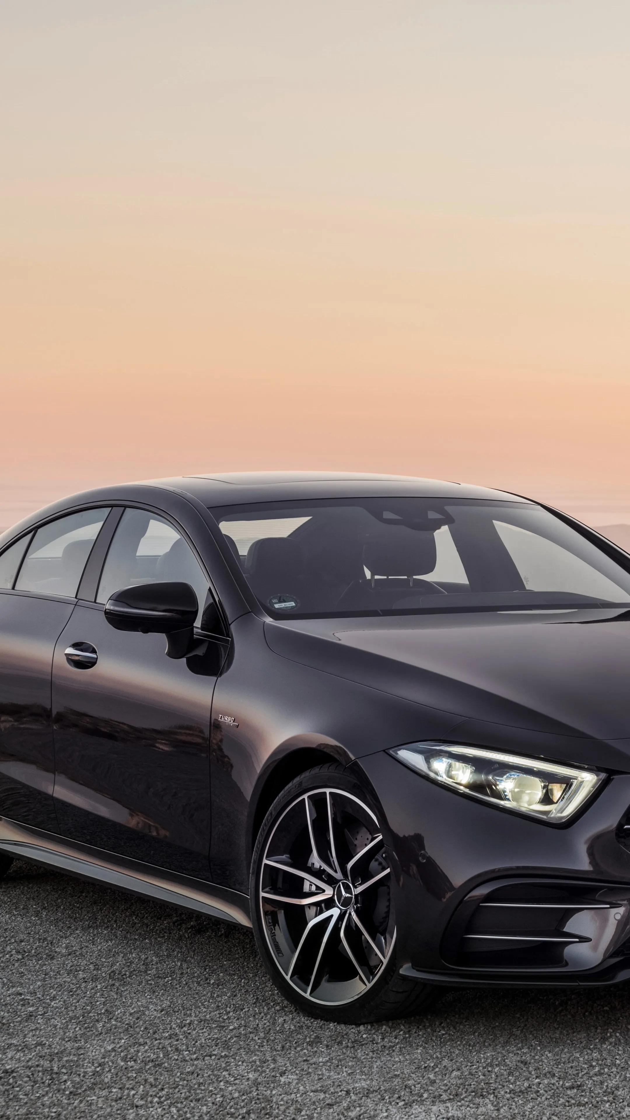 Black Mercedes Benz Coupe with Sunset Background and Style