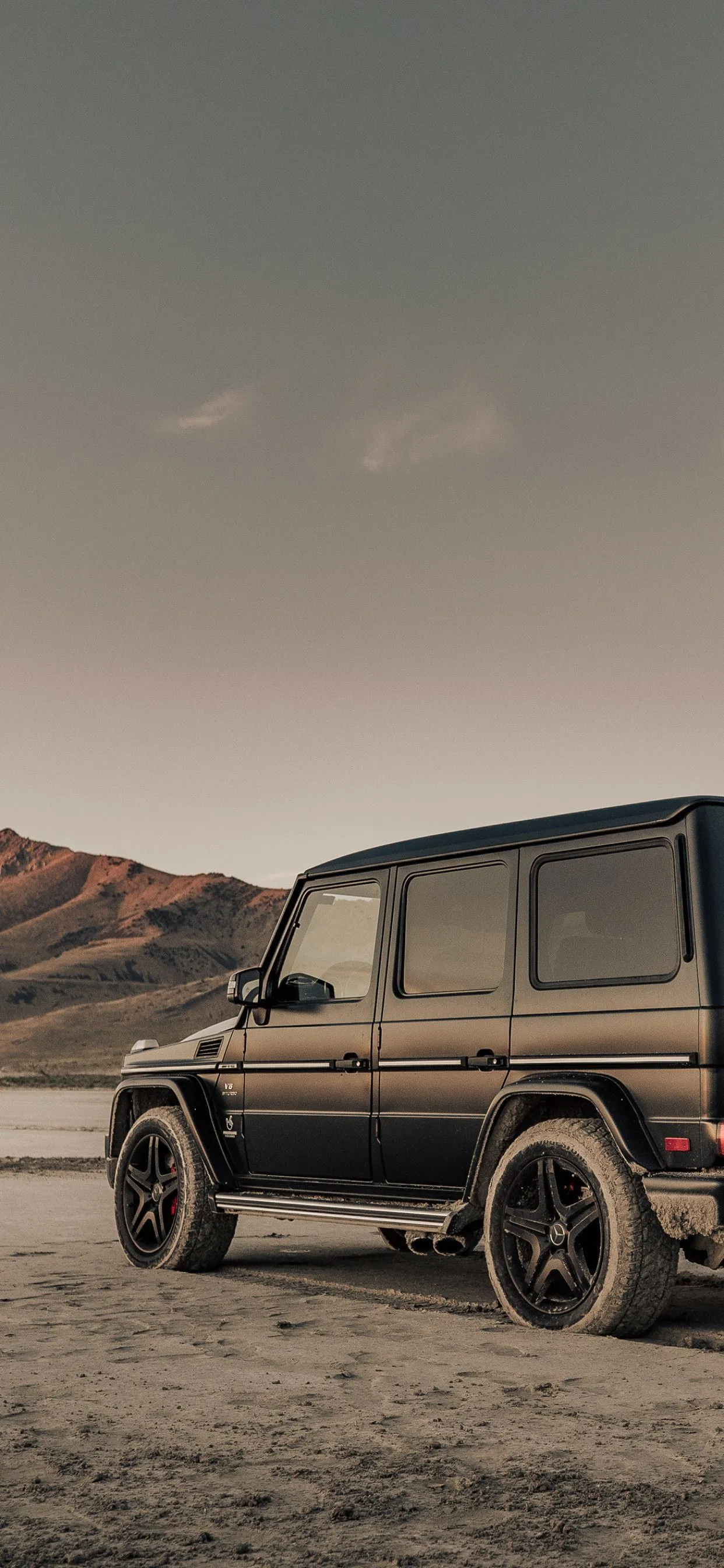 Black Mercedes Benz G Class SUV Parked in Desert Area