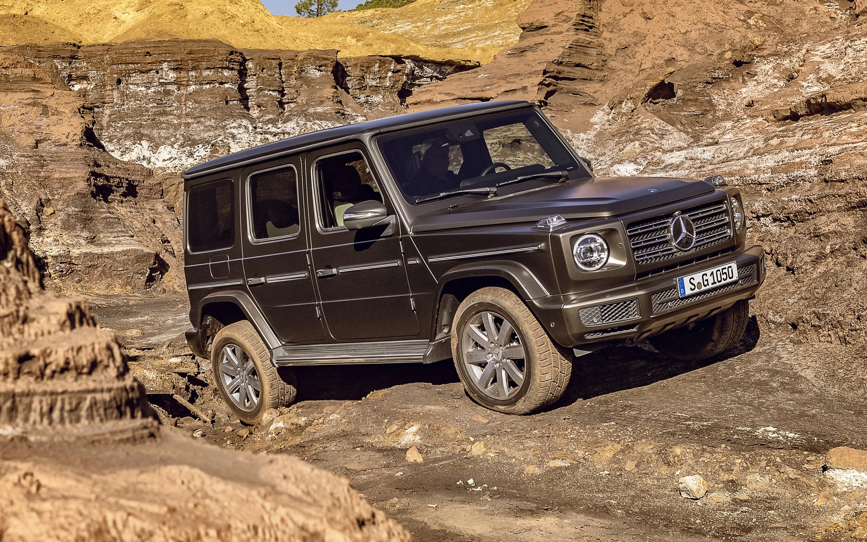 Black Mercedes Benz G Wagon Offroad Driving on Rugged Path