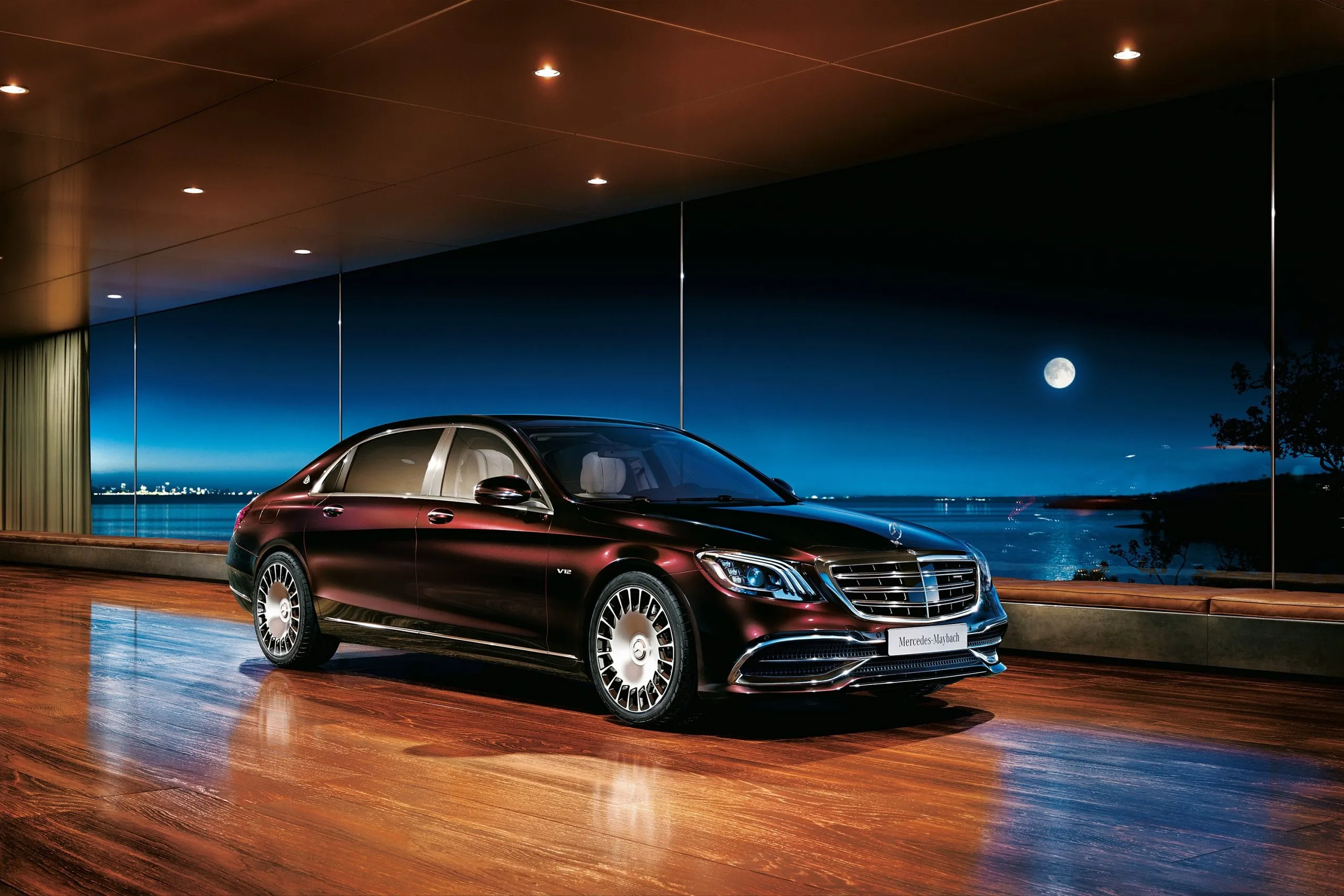 Black Mercedes Benz Luxury Sedan Parked in the Reflective Floor