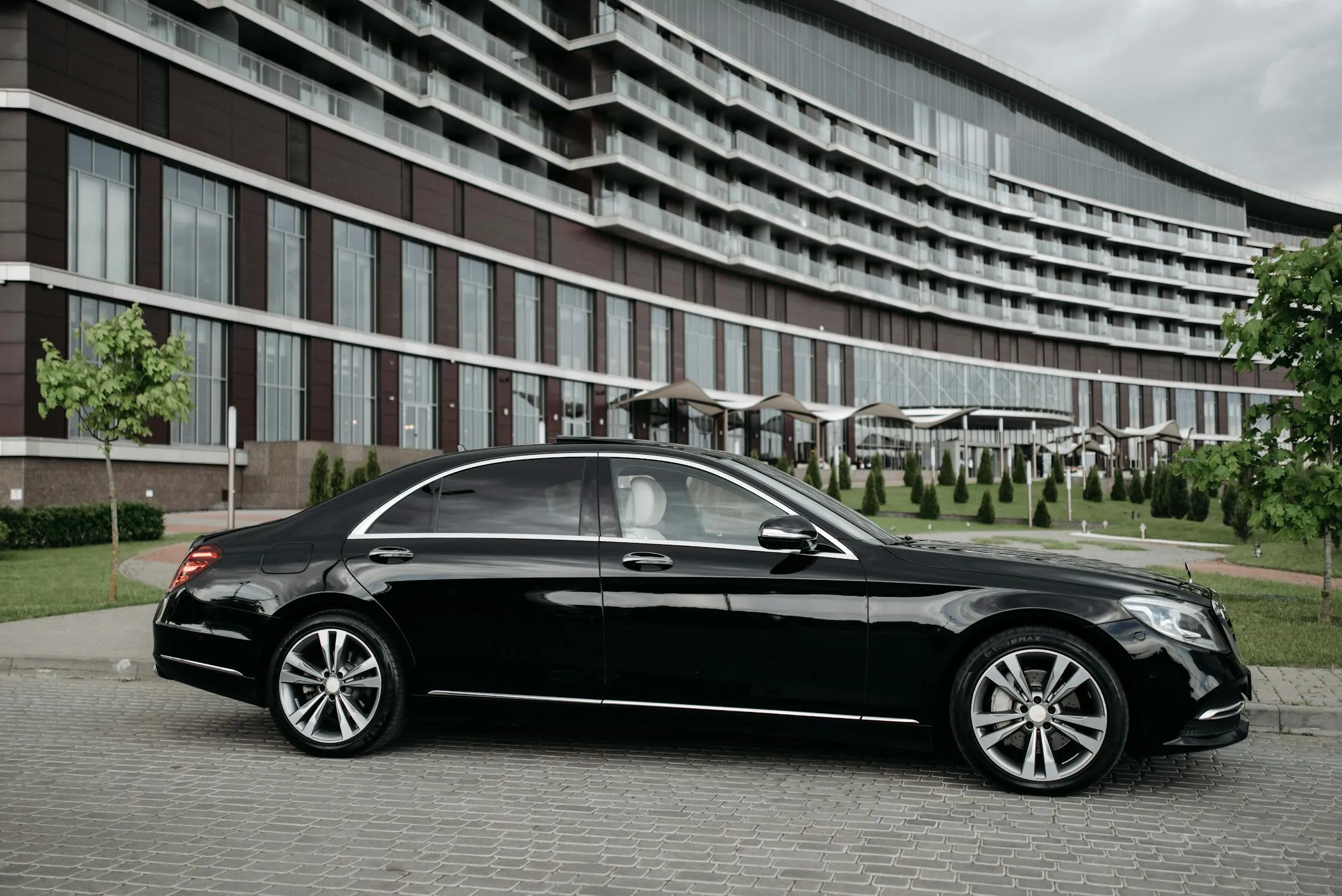 Black Mercedes Benz Parked in Urban Setting Wallpaper4K
