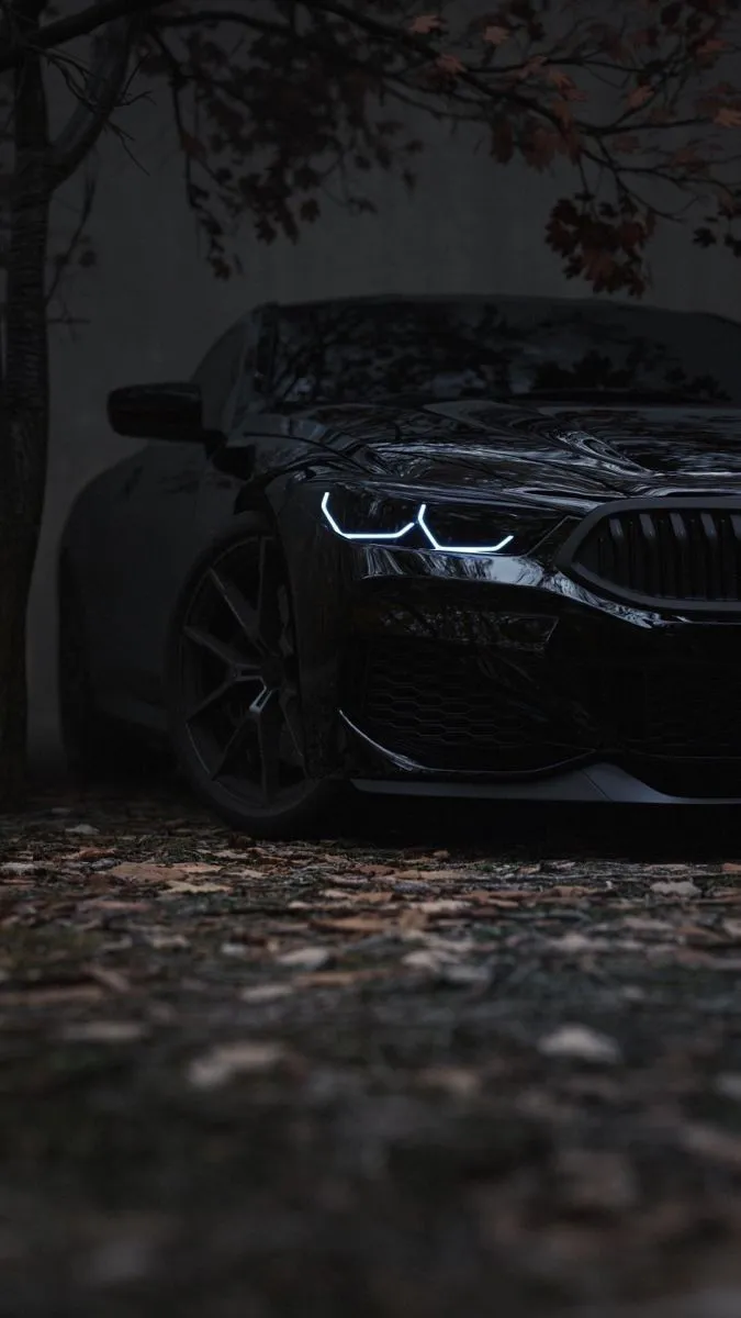 Black Mercedes Benz Partially Hidden in Shadows Wallpaper