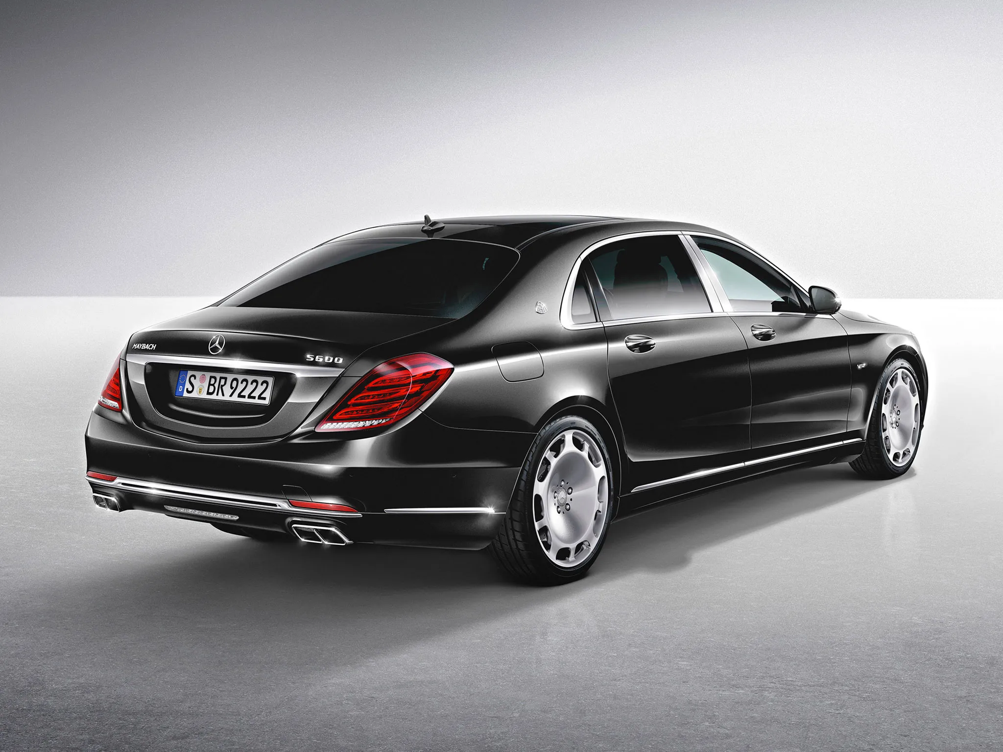 Black Mercedes Benz Sedan in Bright Studio Background