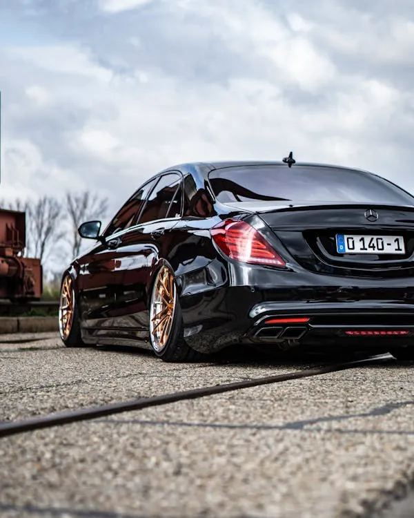 Black Mercedes Benz Sedan with Customized Wheels Wallpaper