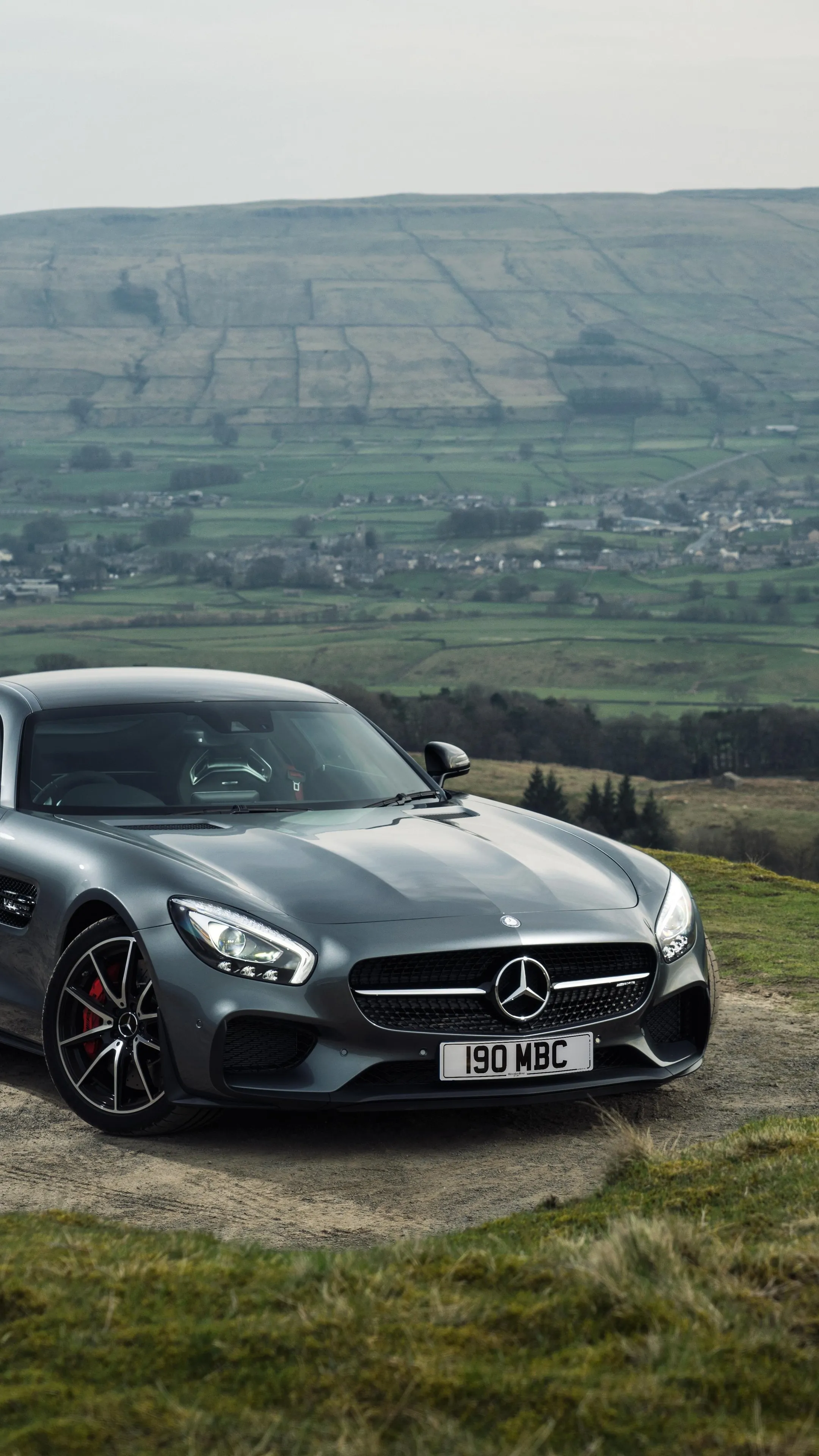 Black Mercedes Benz Sports Car Parked in Field Wallpaper