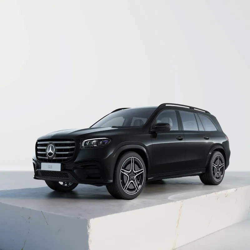 Black Mercedes Benz SUV Displayed on White Platform