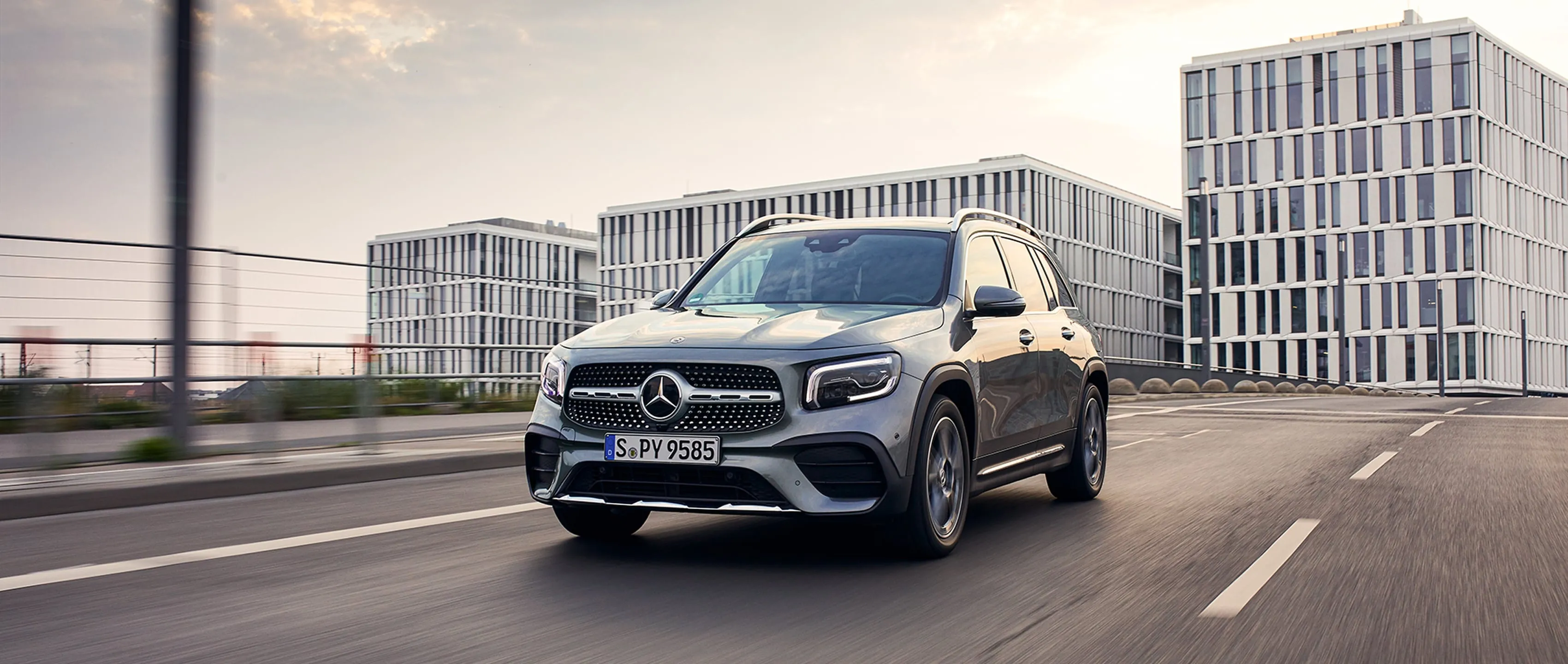 Black Mercedes Benz SUV Driving in Modern Urban Area 4K