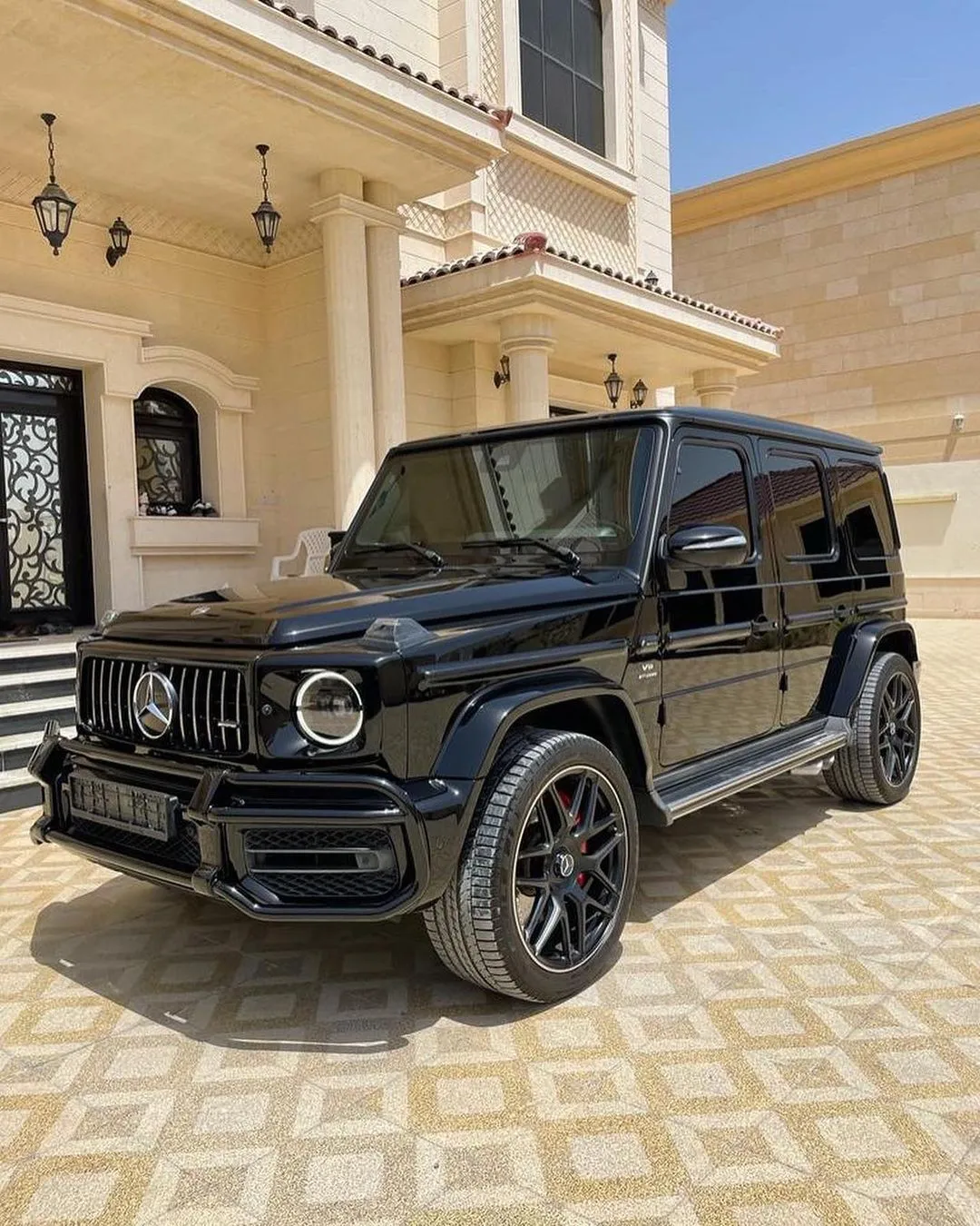 Black Mercedes Benz SUV Parked on Paved Driveway Wallpaper