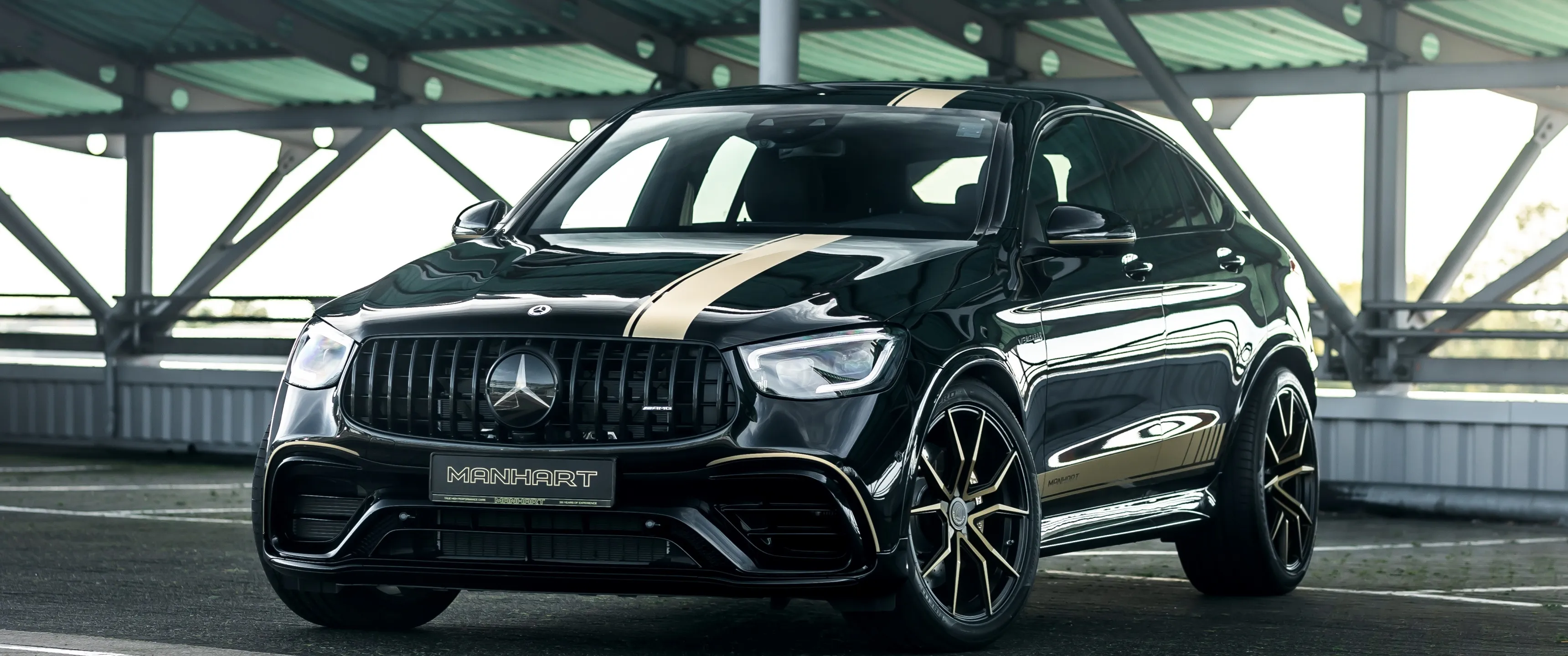 Black Mercedes Benz SUV Parked Under Metal Roof Wallpaper