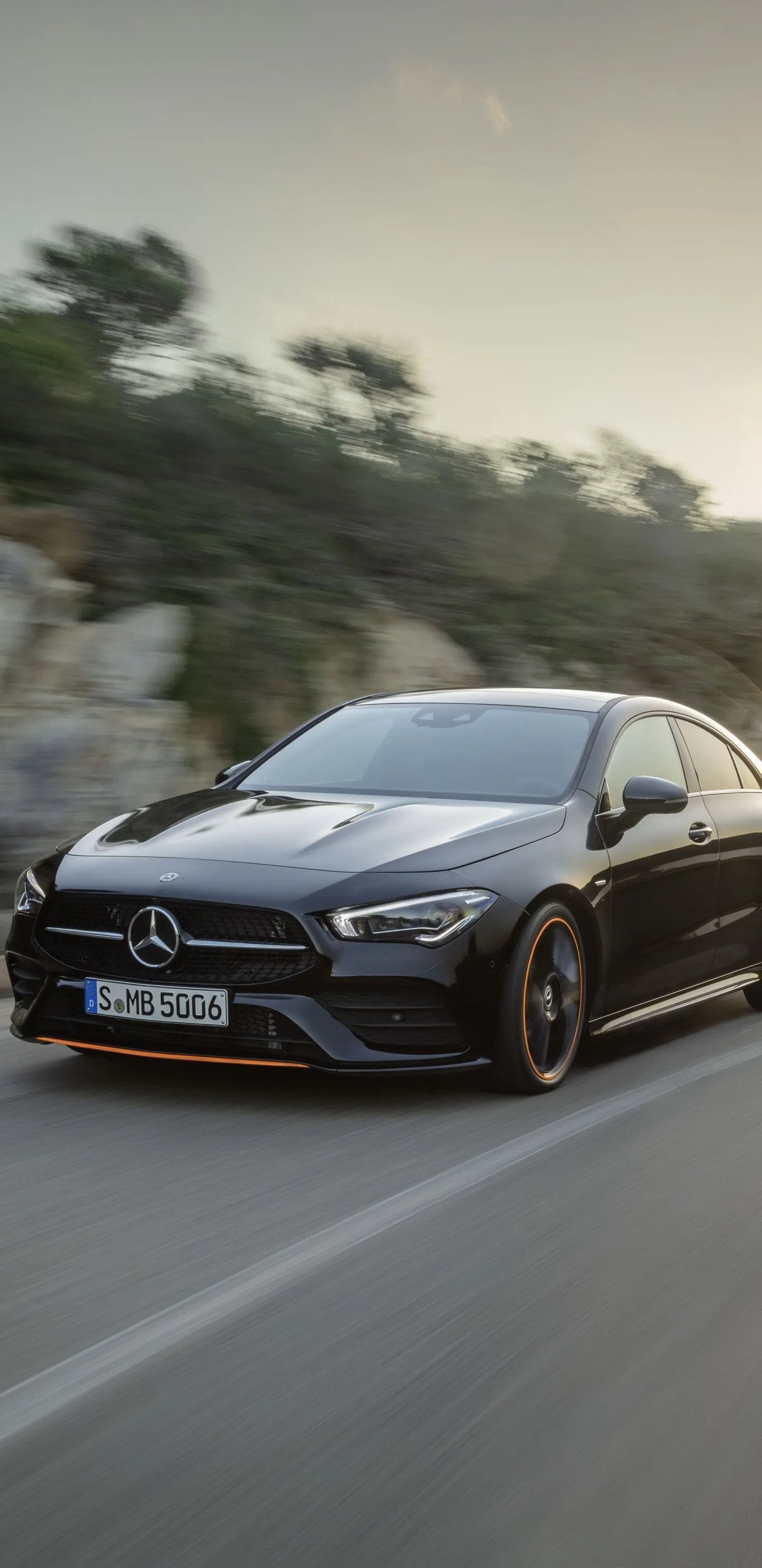 Black Mercedes Driving Fast On A Mountain Road Wallpaper