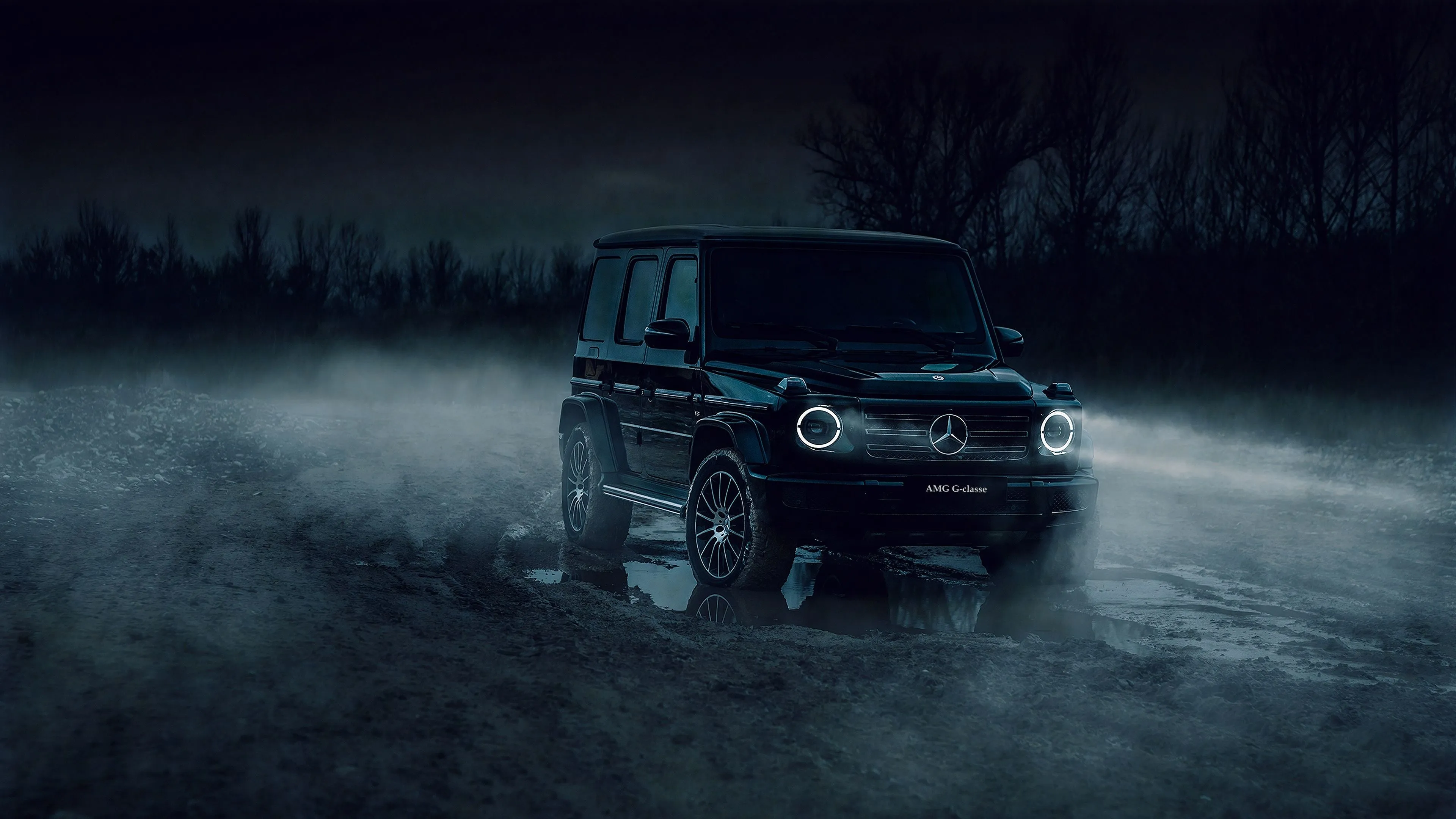 Black Mercedes G Wagon in Misty Forest Scene free Wallpaper