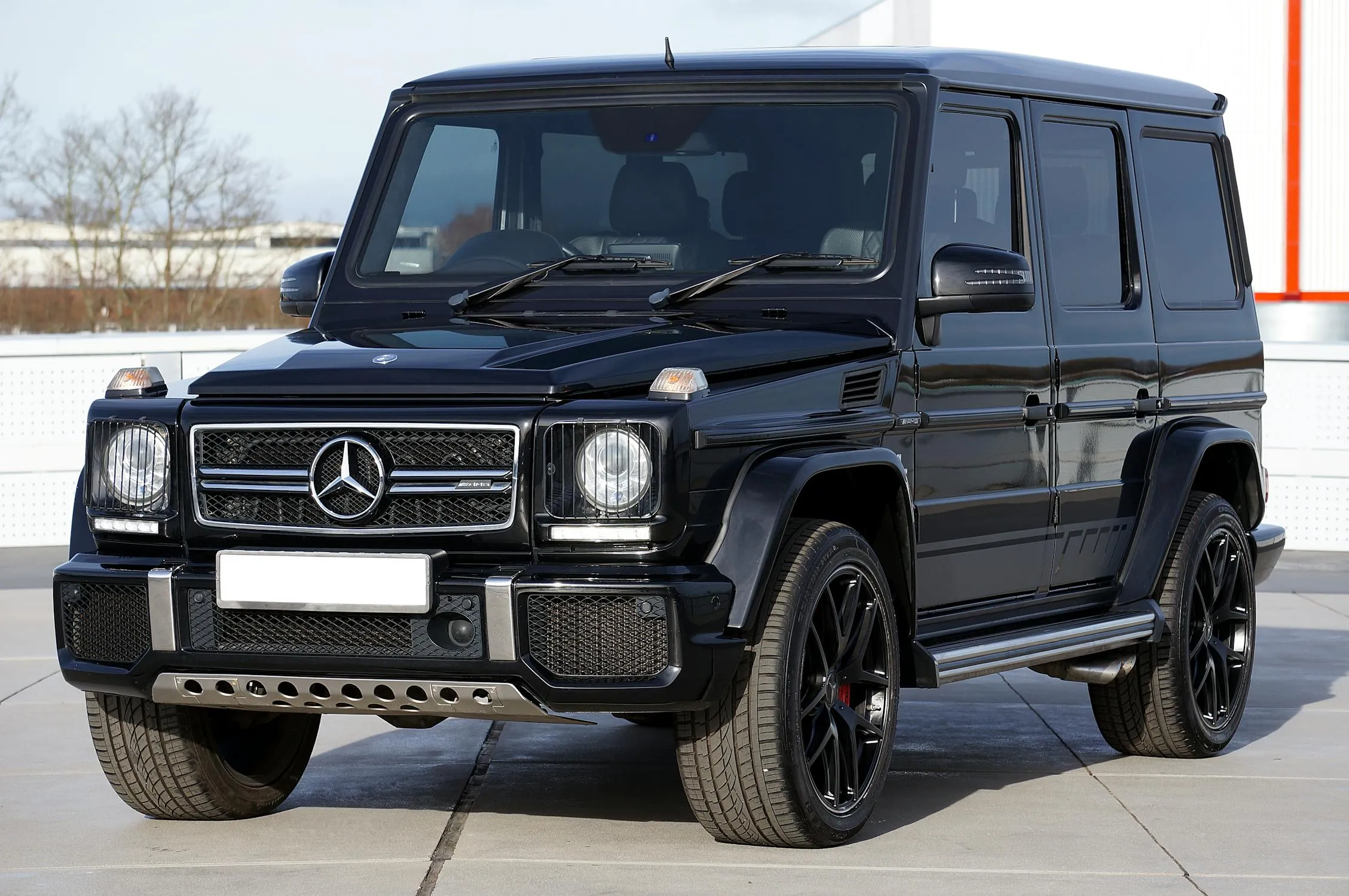 Black Mercedes G Wagon SUV Parked On White Floor image