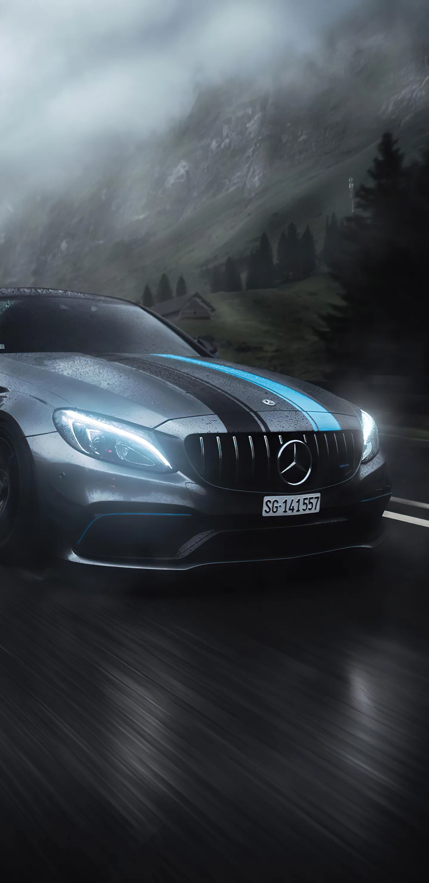 Black Mercedes in Motion in Misty Forest Mountain Road