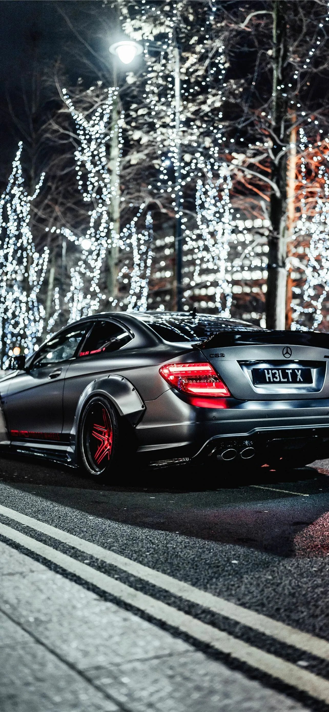 Black Mercedes in Street Lights at Night Scene Wallpaper