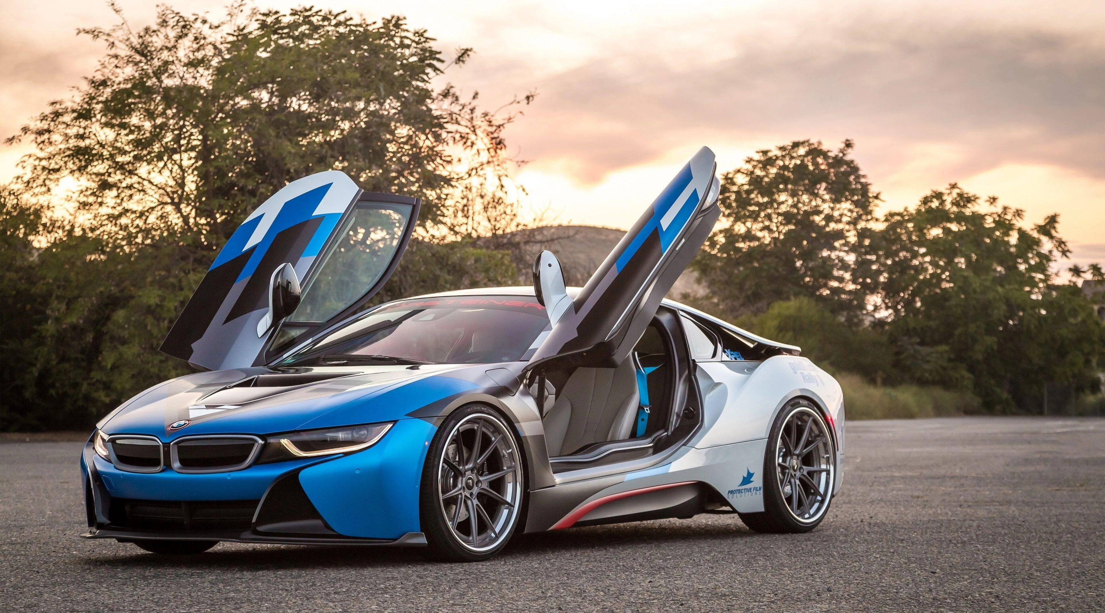 Blue and White Bmw Concept Car with Open Vertical Doors