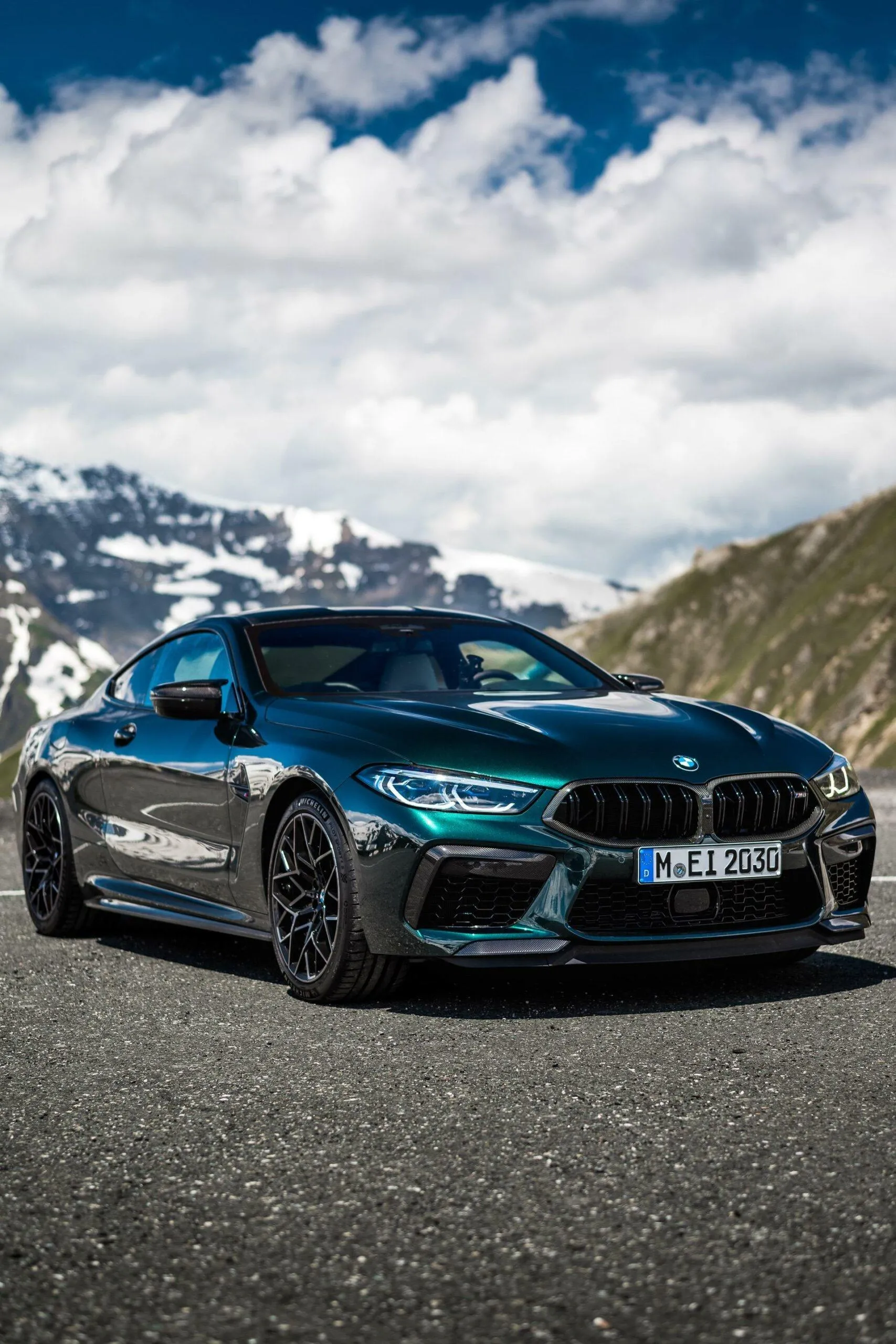 Blue Bmw Coupe Driving on Mountain Road in Scenic Area