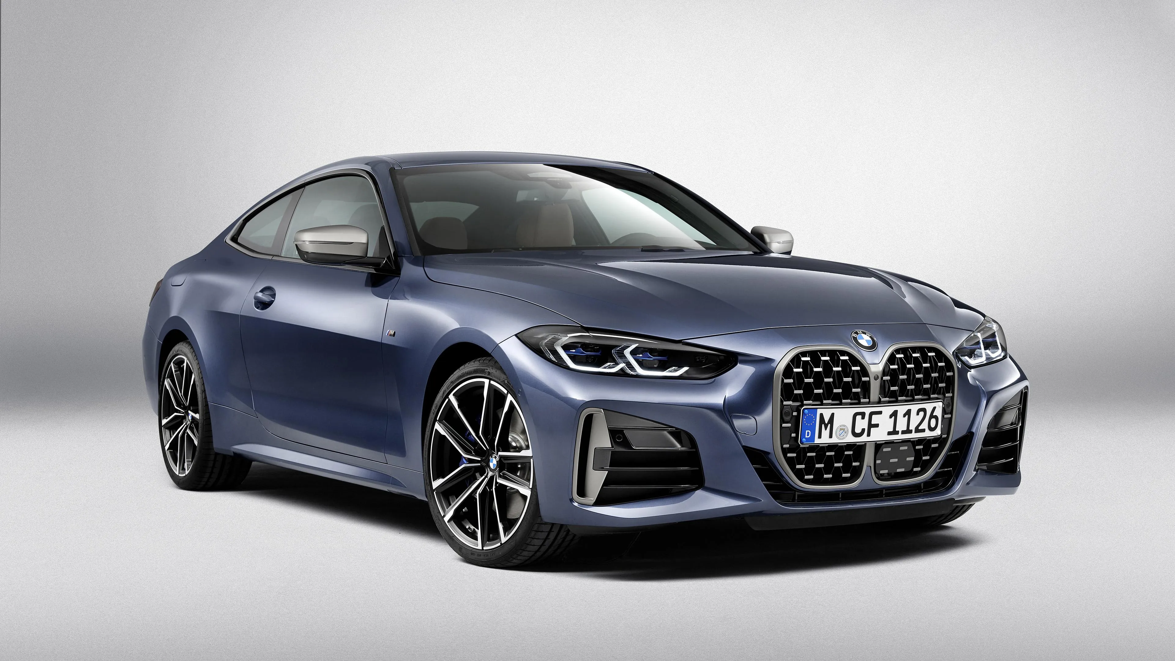 Blue Bmw Coupe on White Background in a Studio Photoshoot