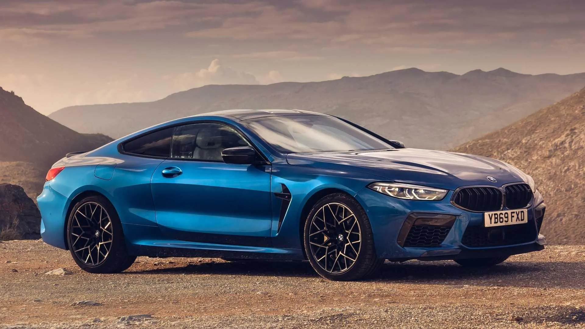 Blue Bmw Coupe Parked on a Mountain Road Wallpaper