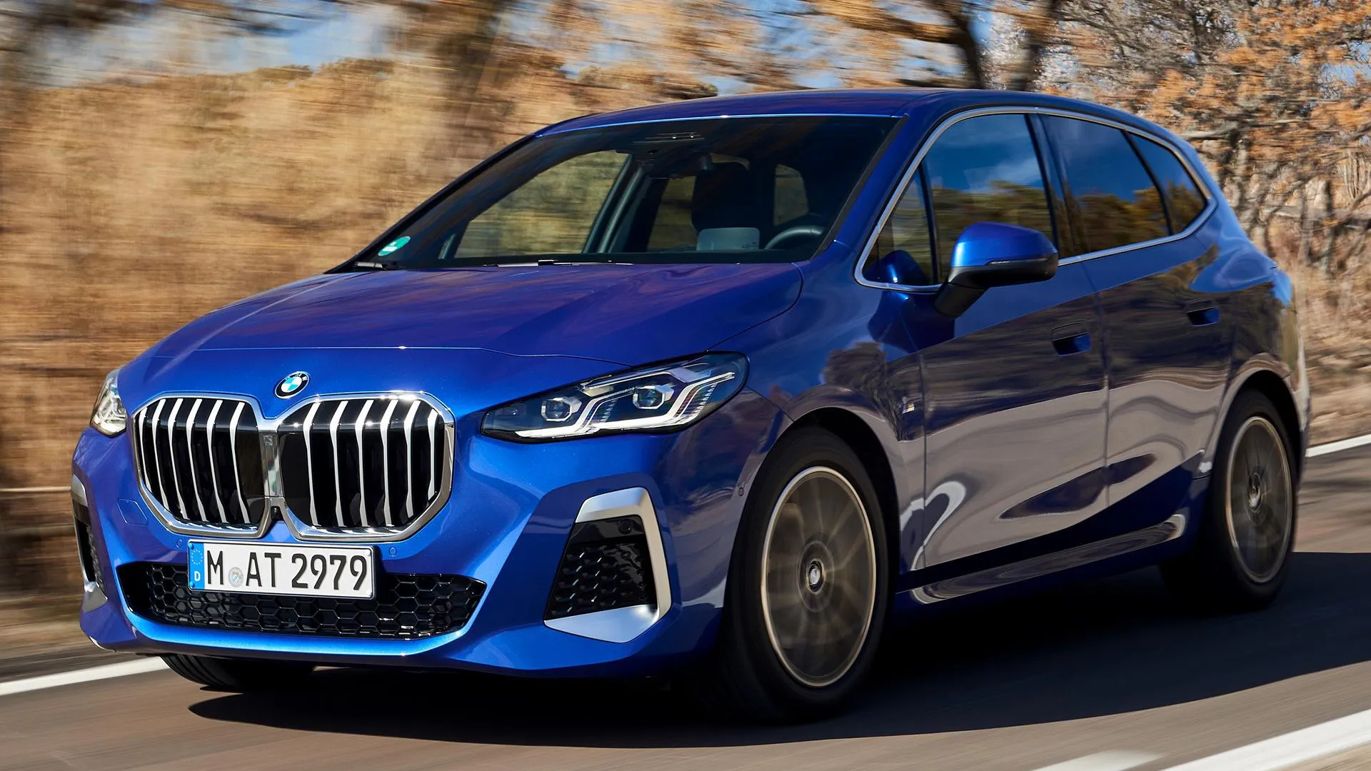 Blue Bmw Hatchback Parked Near Trees on Sunny Day Wallpaper