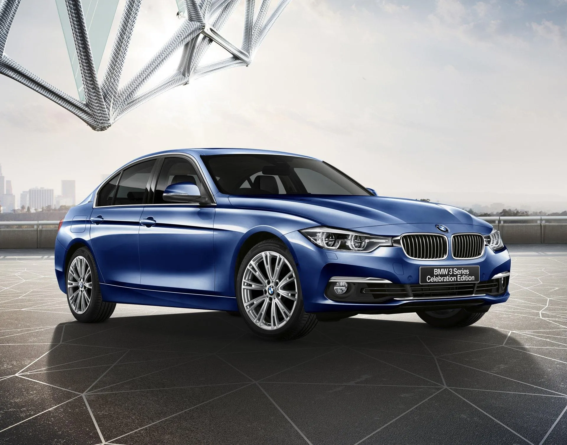 Blue Bmw Parked Near Modern Architecture and Skyline View