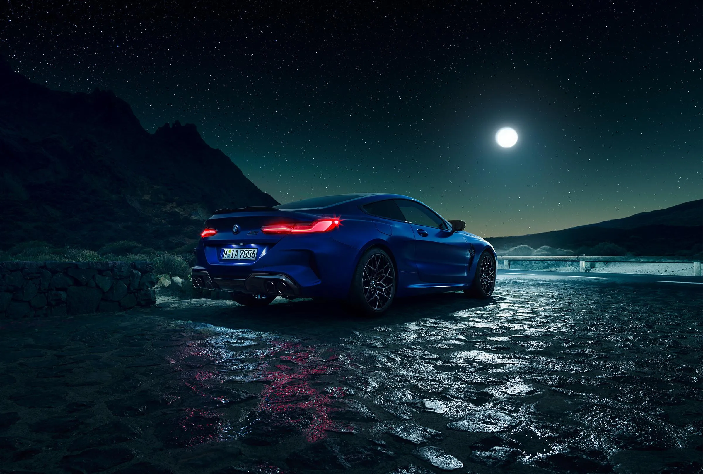 Blue Bmw Parked Under Moonlight Near Mountain Lake Image