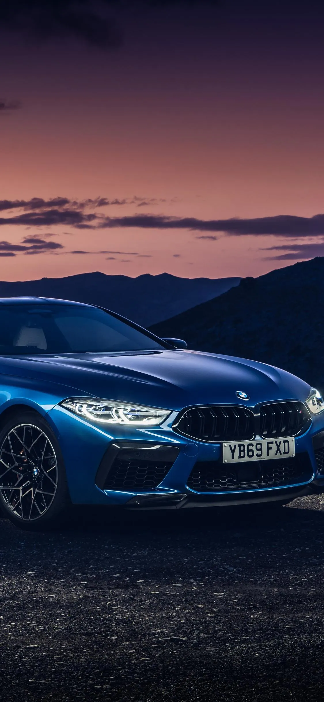 Blue Bmw Sedan Parked at Dusk Near Mountain Hd Image