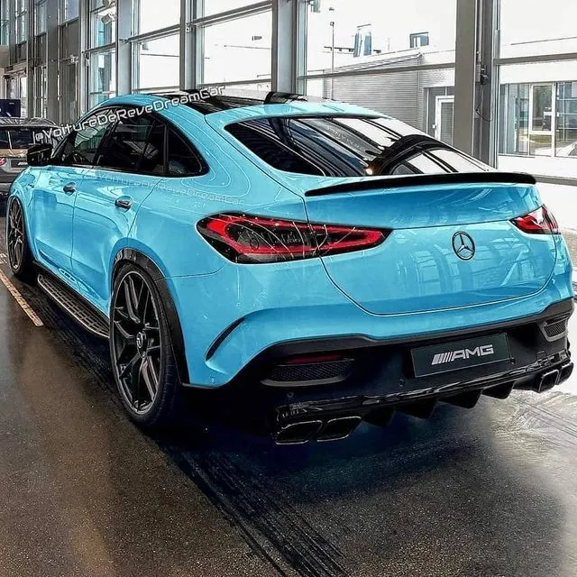 Blue Mercedes Benz Coupe in Bright Modern Indoor Setting