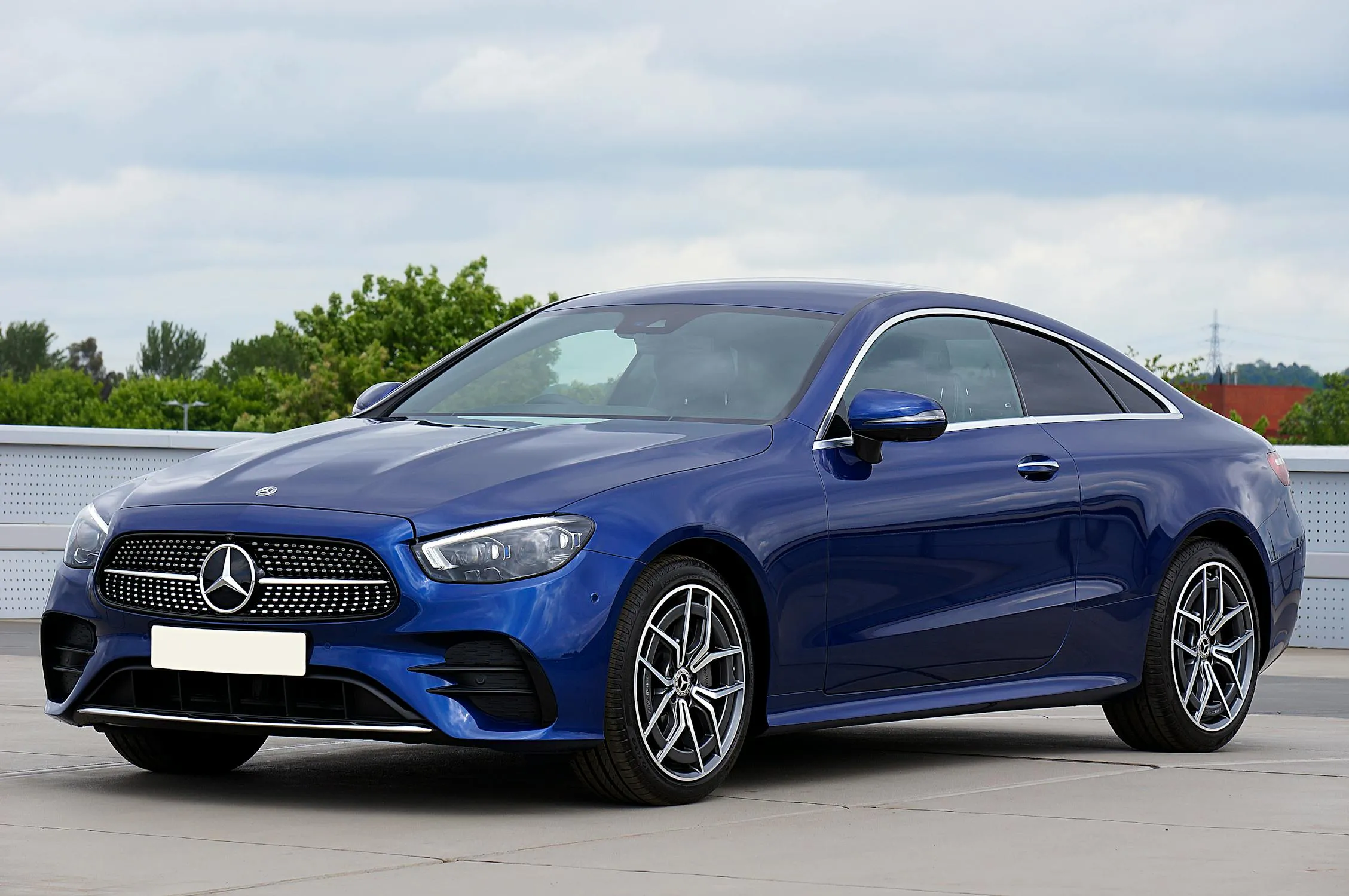 Blue Mercedes Benz Coupe Parked Outdoors free Wallpaper