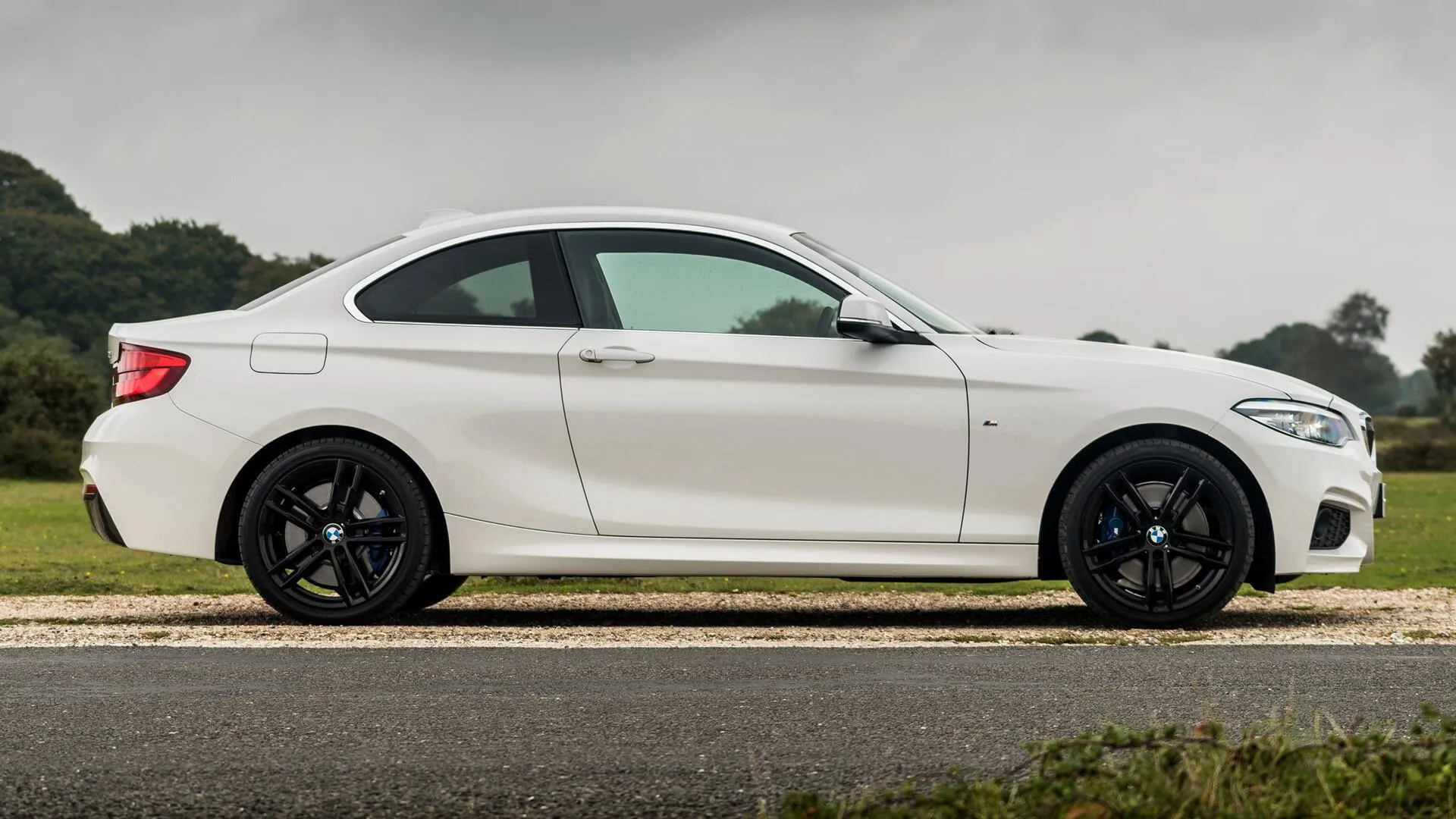 Bmw 2 Series in a Calm Outdoor Setting with Clean Road View