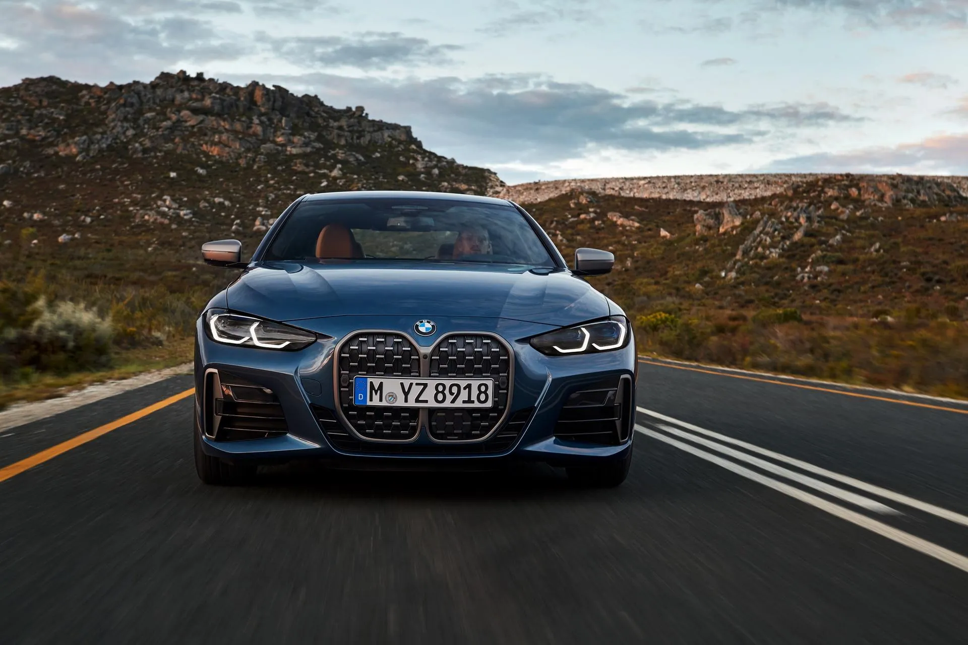 Bmw 4 Series Car Driving with Mountain View Background Image