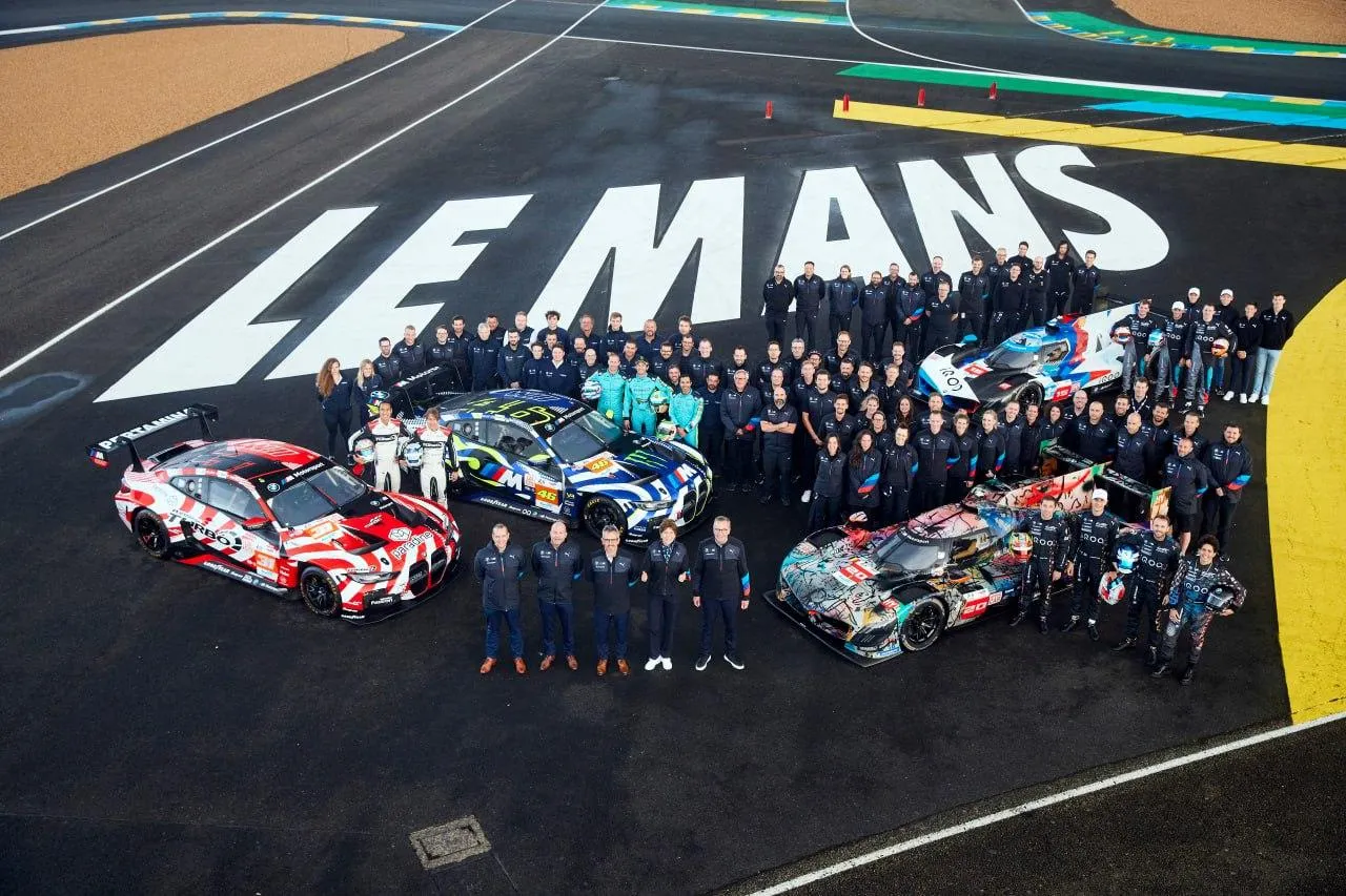 Bmw at Le Mans Event Showing Teams and Race Cars Wallpaper