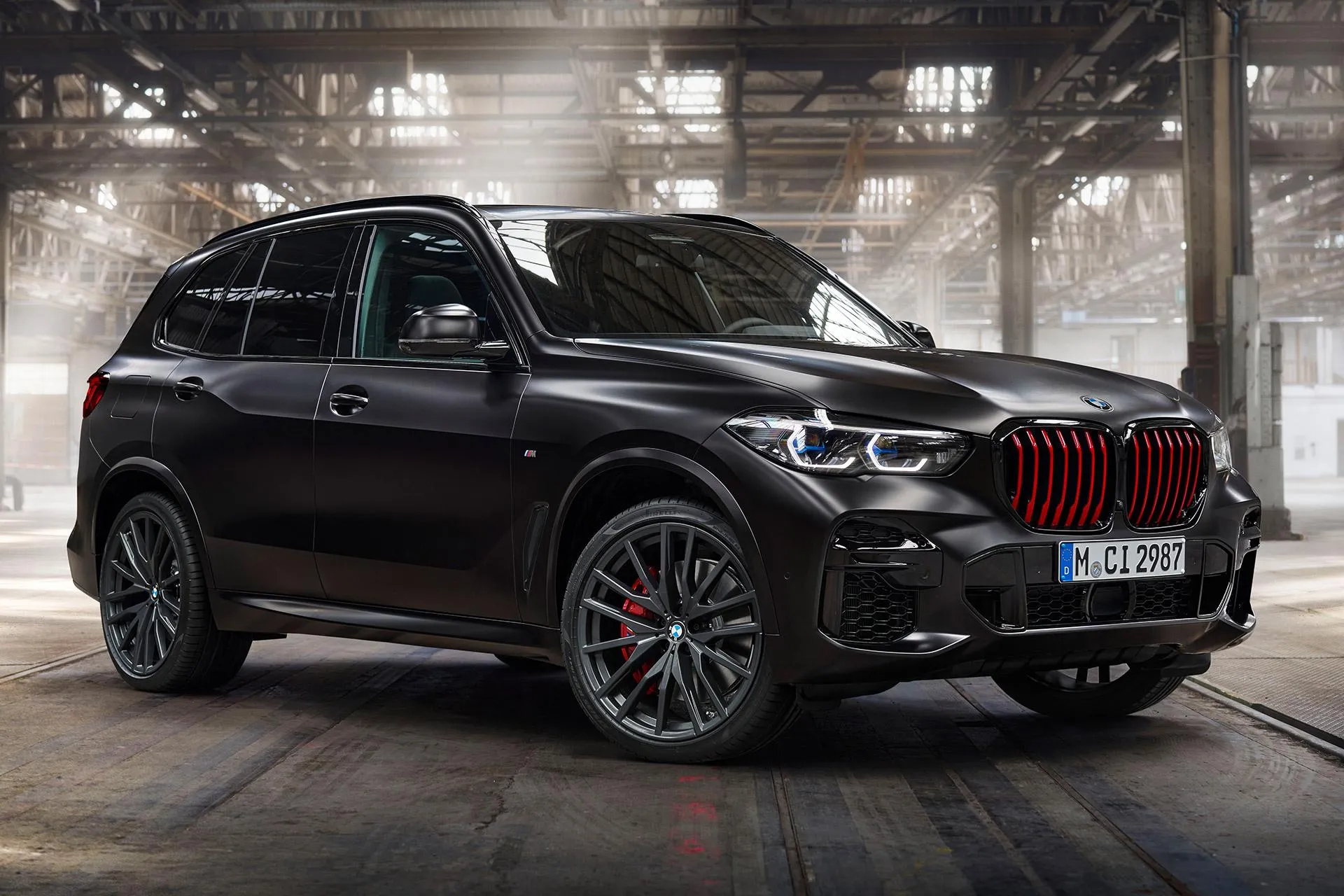 Bmw Black Suv in Industrial Setting with Dramatic Light