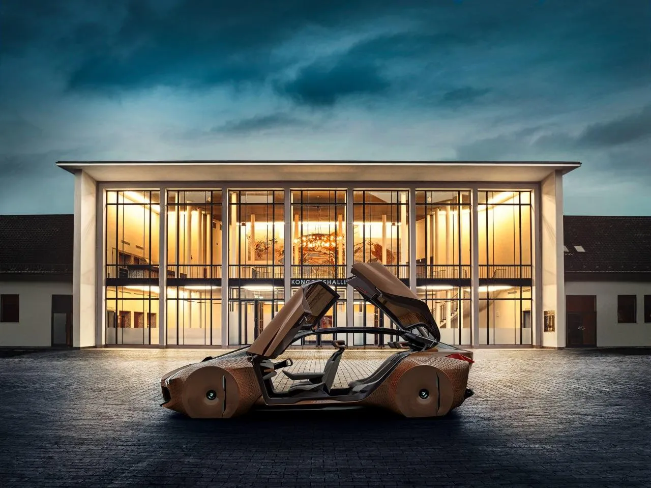 Bmw Car Displayed Outside a Large Modern Illuminated Villa