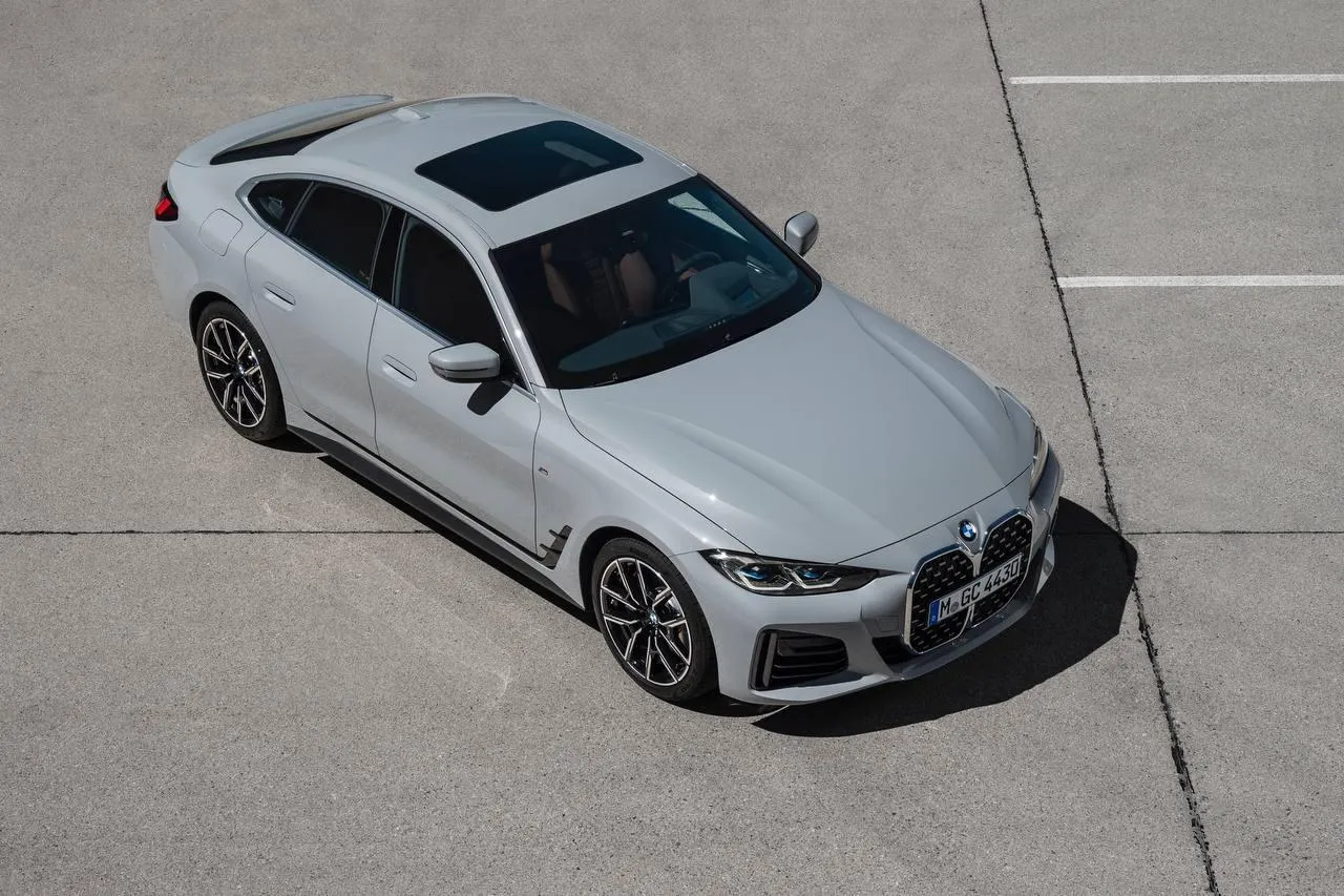 Bmw Car in a Parking Lot with Modern Architecture Image