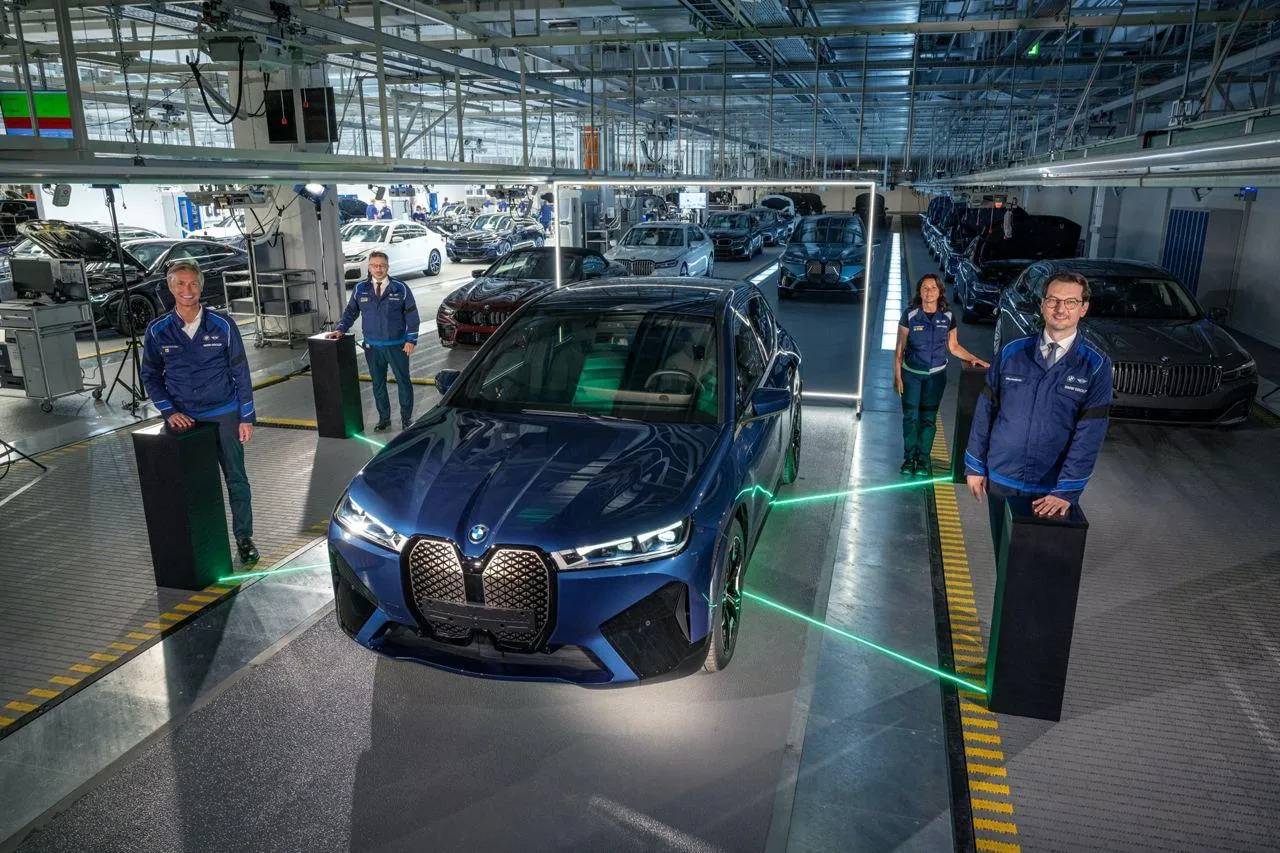 Bmw Car in Assembly Line with Workers on Production Floor