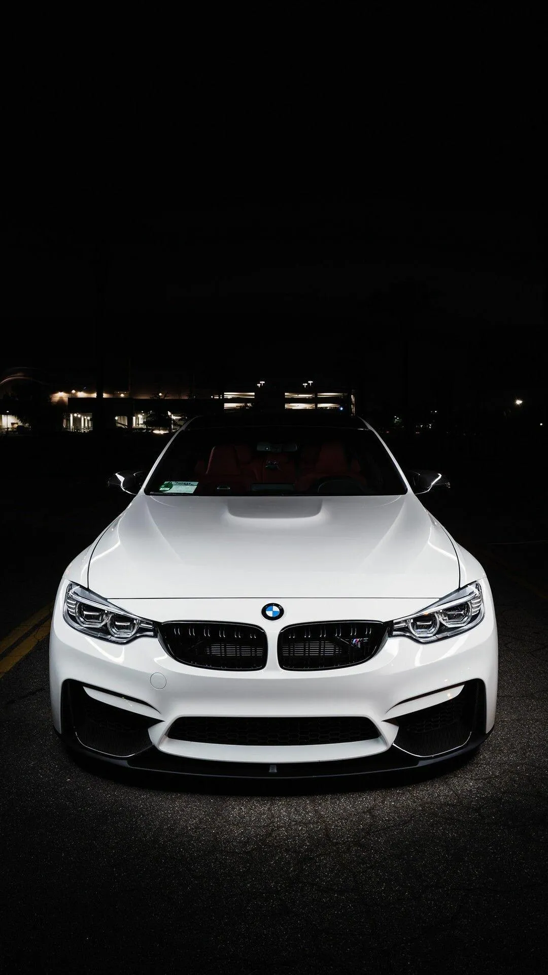 Bmw Car in Dark Setting with Bold Front Grille Wallpaper