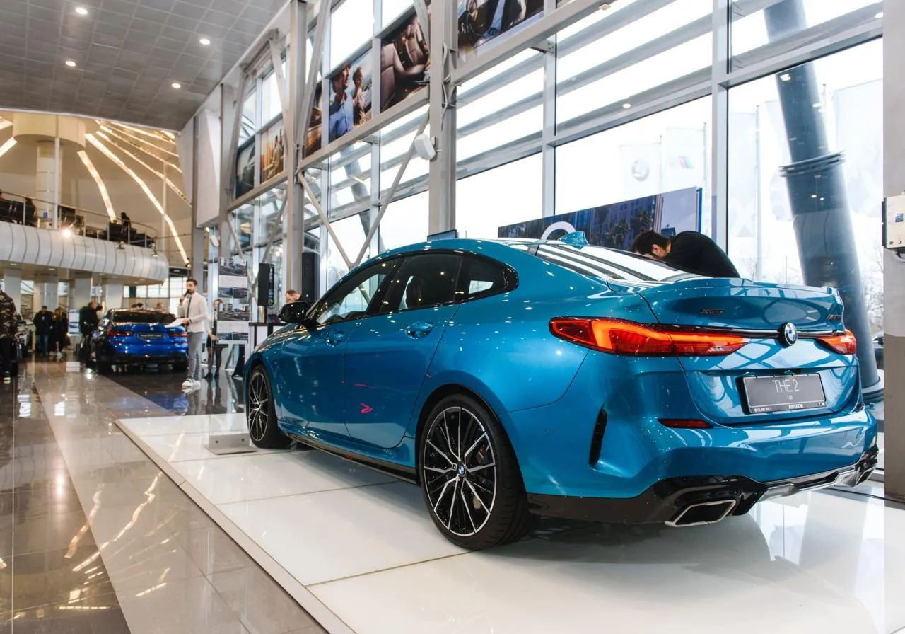 Bmw Car Model on Display in a Modern Showroom with Glass Walls