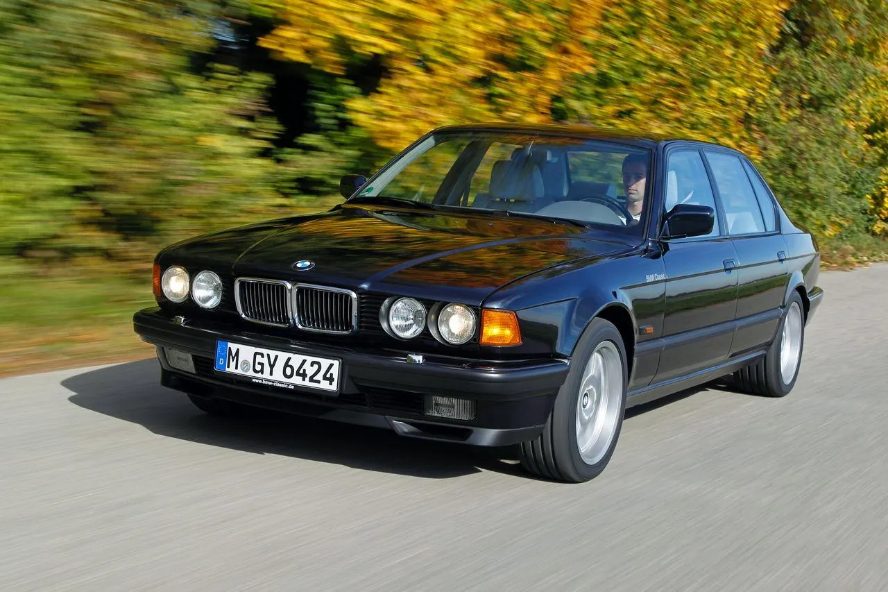 Bmw Car on the Road in Front of a Stylish Cityscape