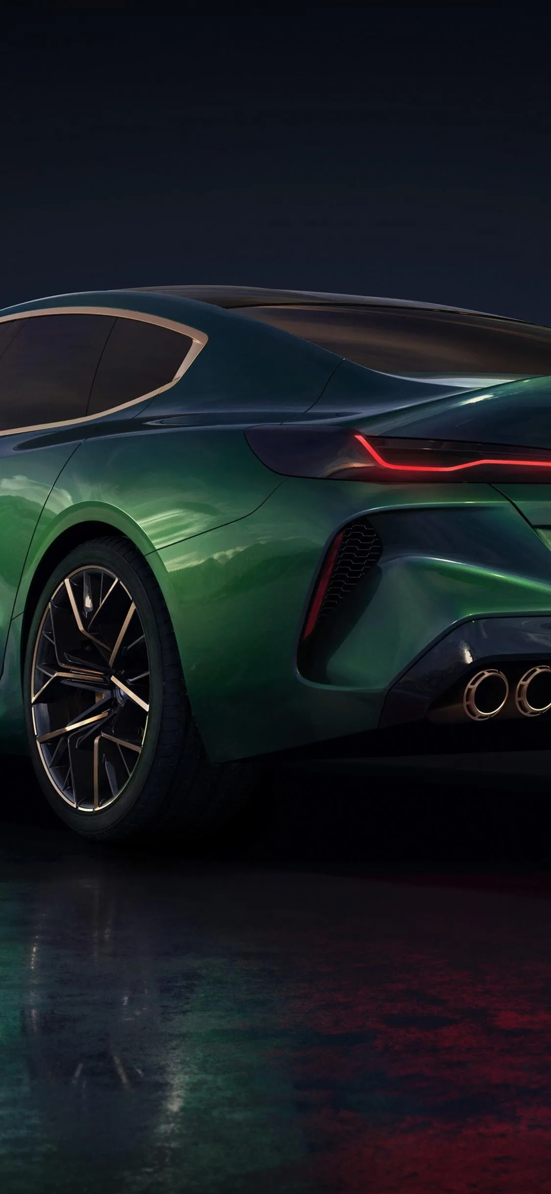 Bmw Car Showcased in a Vibrant City Backdrop at Night