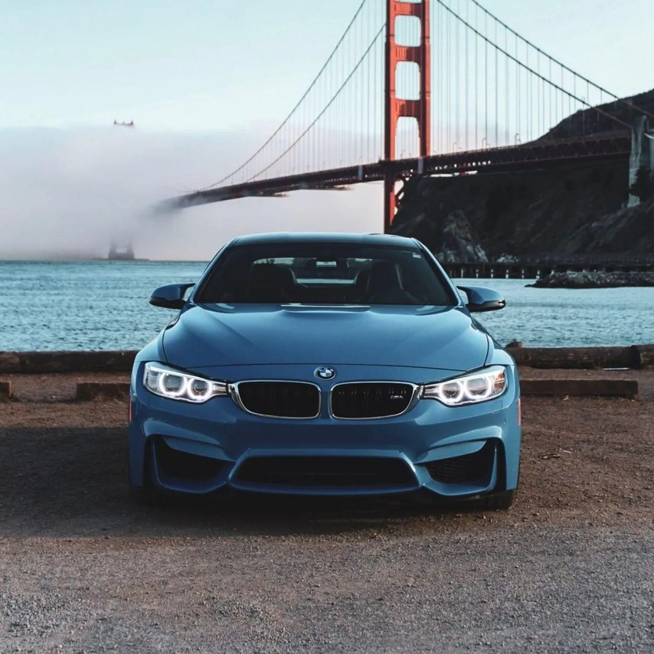 Bmw Car with Golden Gate Bridge and Ocean Background