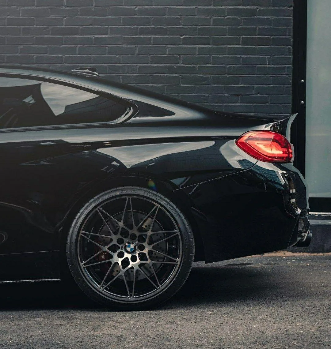 Bmw Car with Sporty Design and Blacked Out Rims Wallpaper