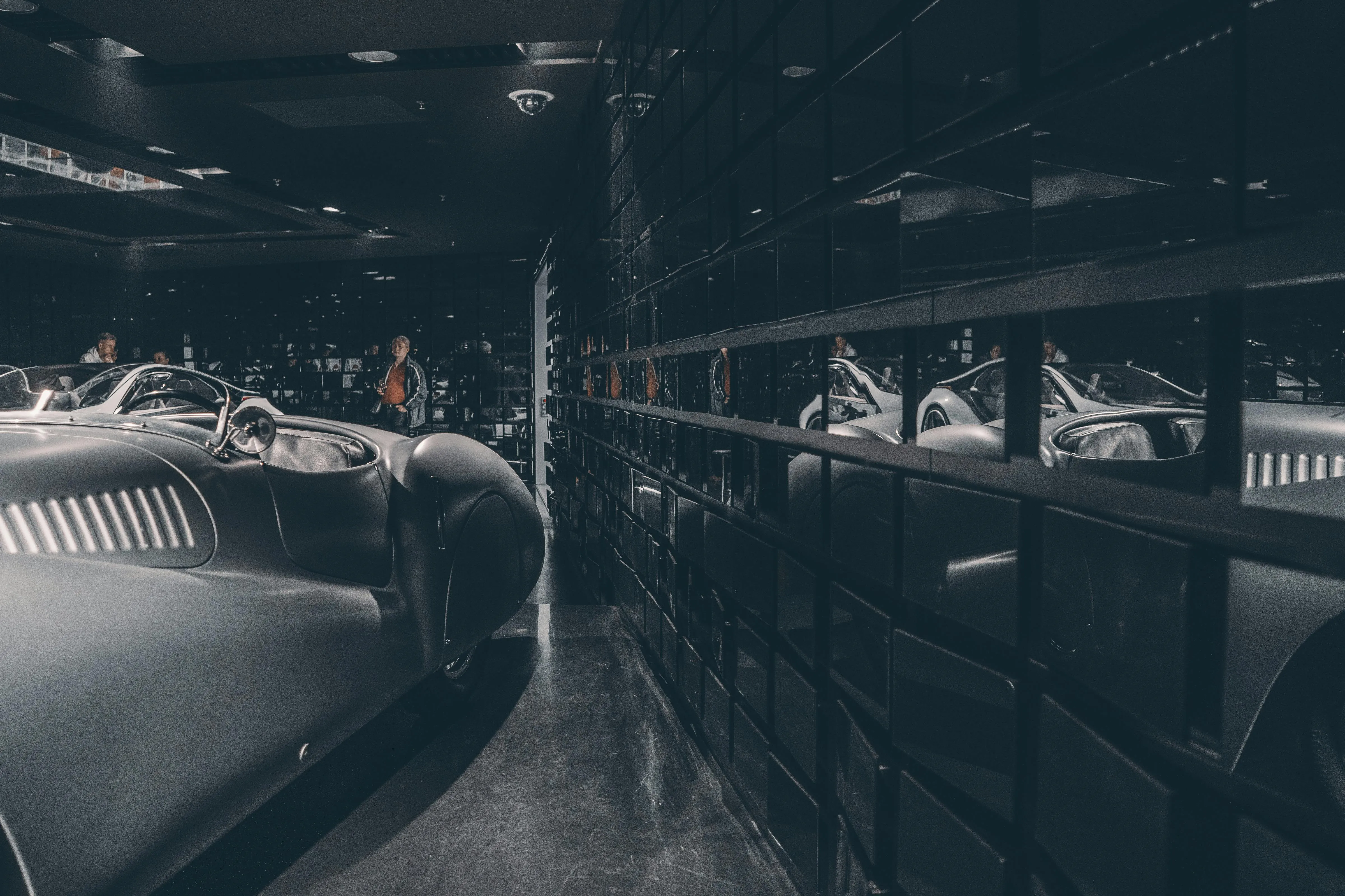 Bmw Cars Lined Up in Dark Indoor Parking Garage Image