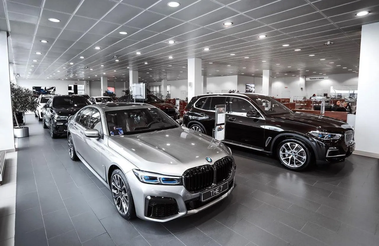 Bmw Cars on Display in Modern Showroom 4K Wallpaper