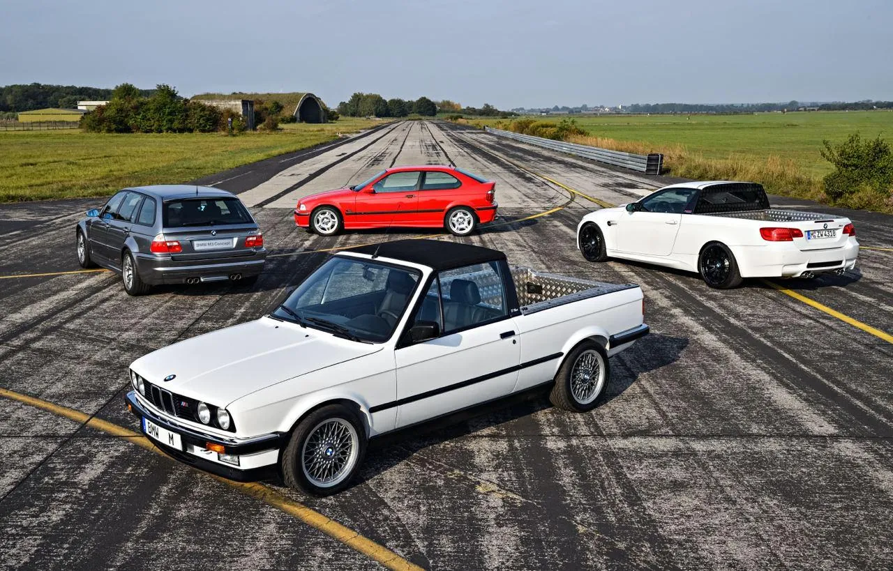 Bmw Classic Convertible on a Wide Open Road with Landscape
