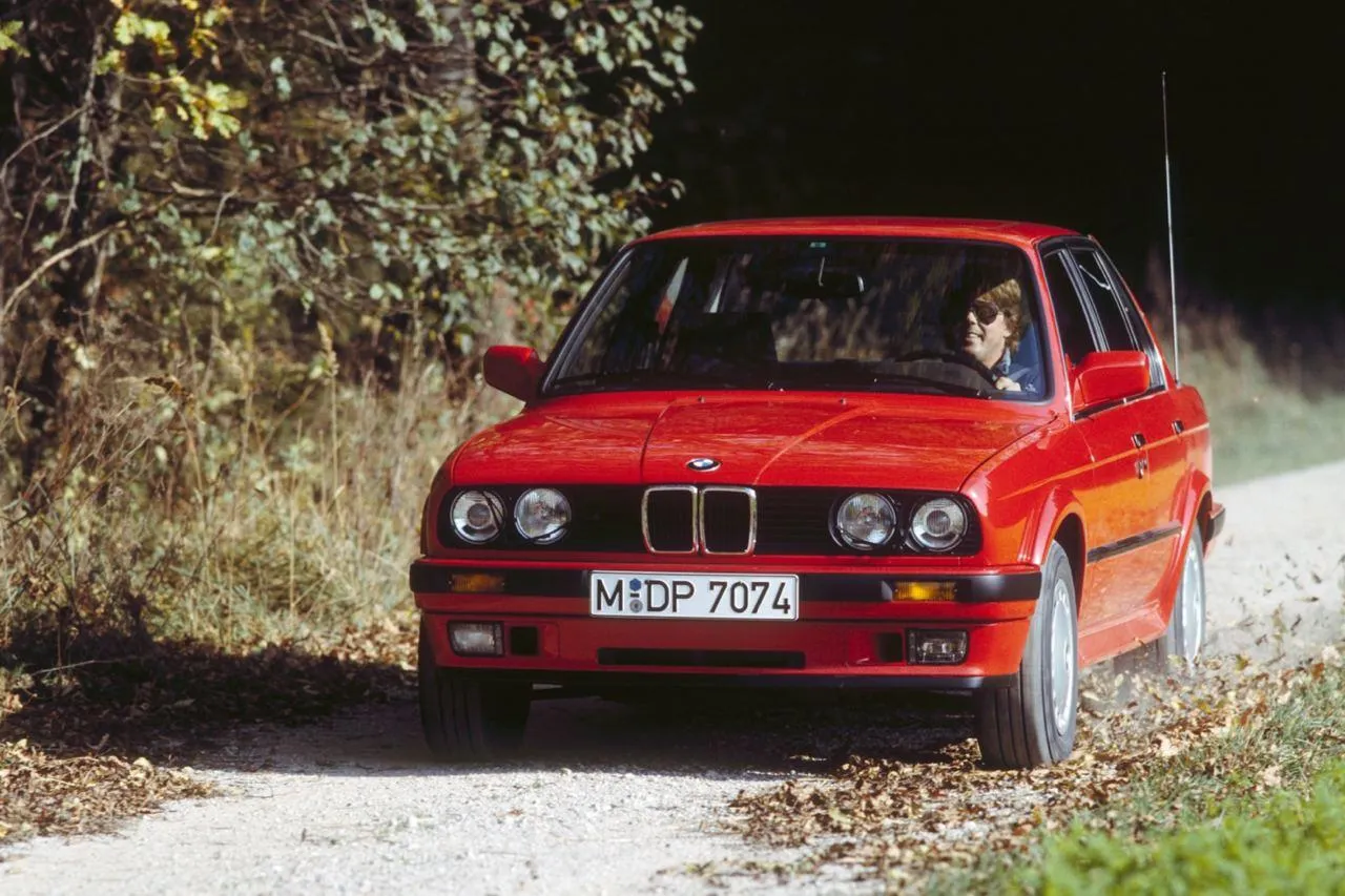 Bmw Classic Red Car on Dirt Road with Scenic Surroundings