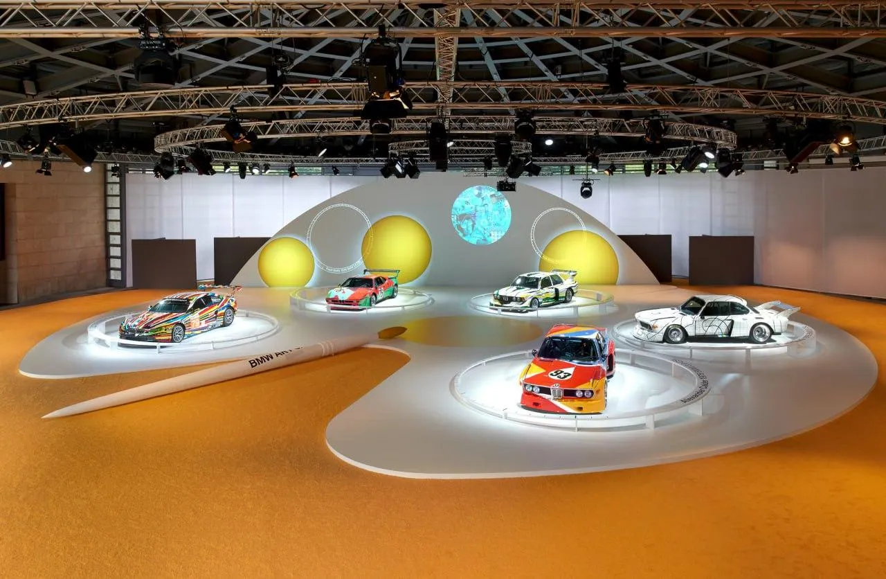 Bmw Concept Car Displayed with Colorful Floating Spheres