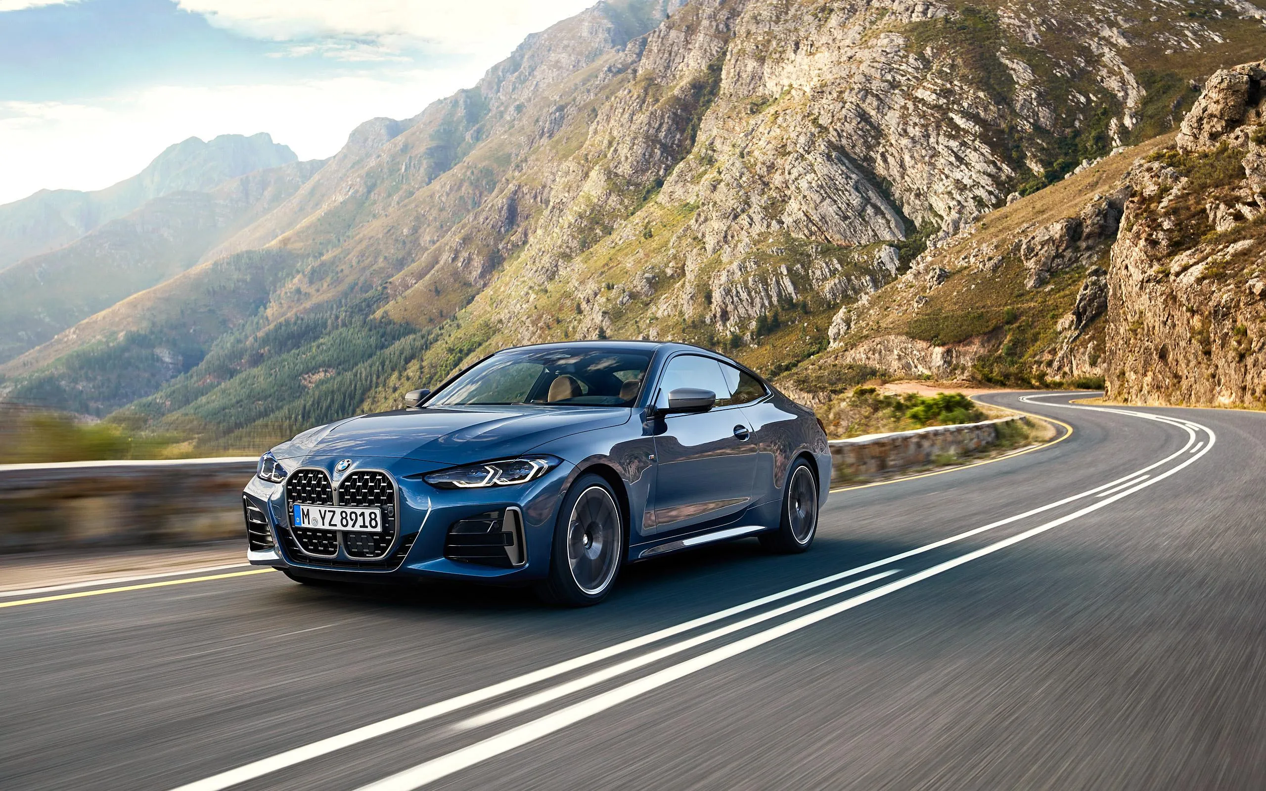 Bmw Convertible Driving on Mountain Curve Road Image