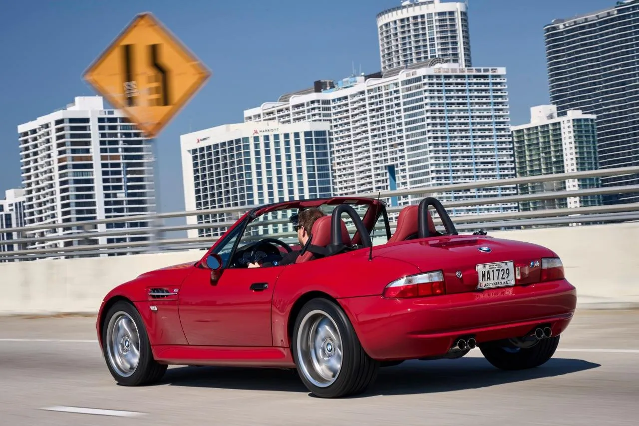 Bmw Convertible on a Sunny Road with a Clear Blue Sky