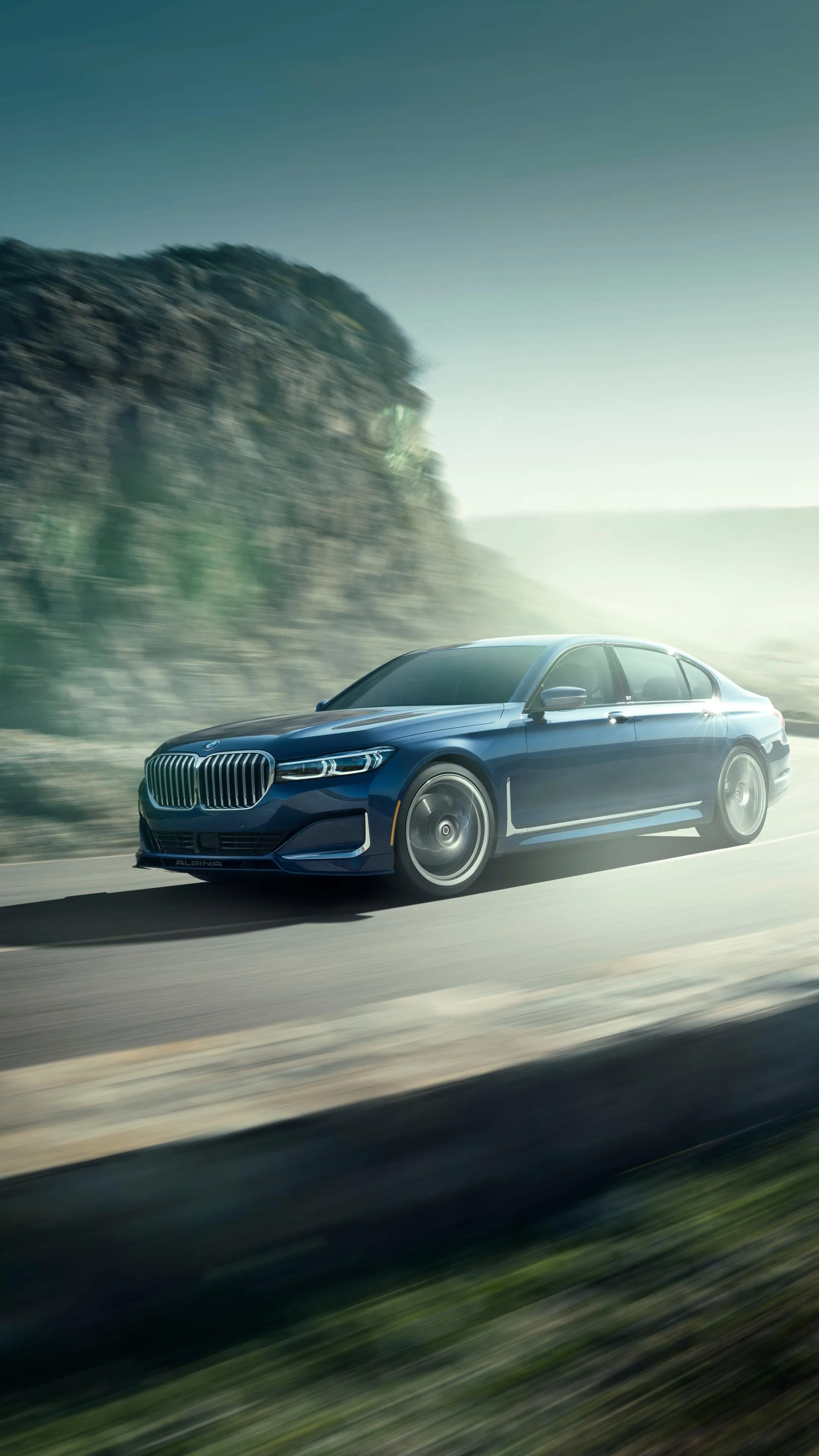 Bmw Driving Fast Along Mountain Cliff Coastal Road