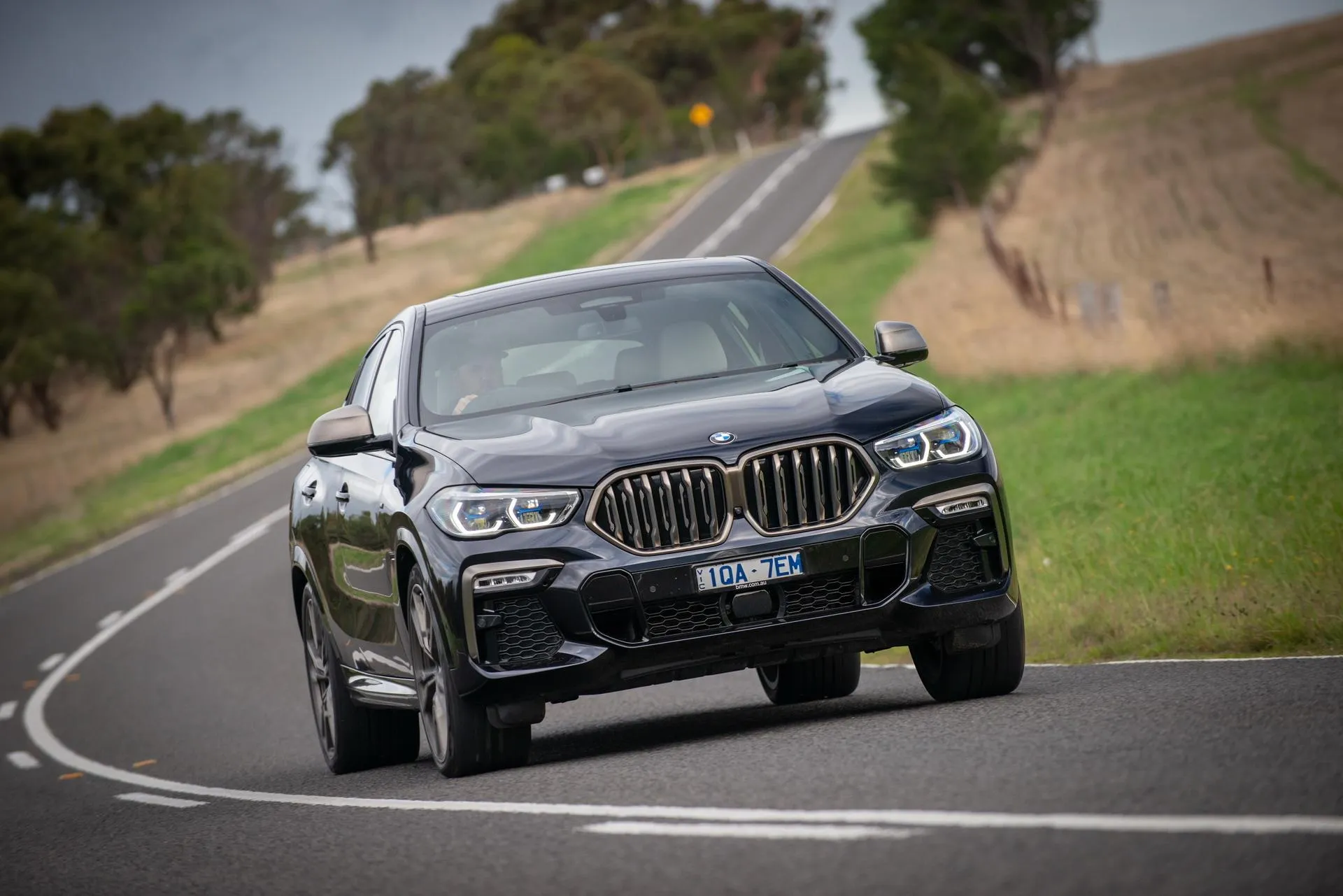 Bmw Driving Fast on a Countryside Road in Daylight